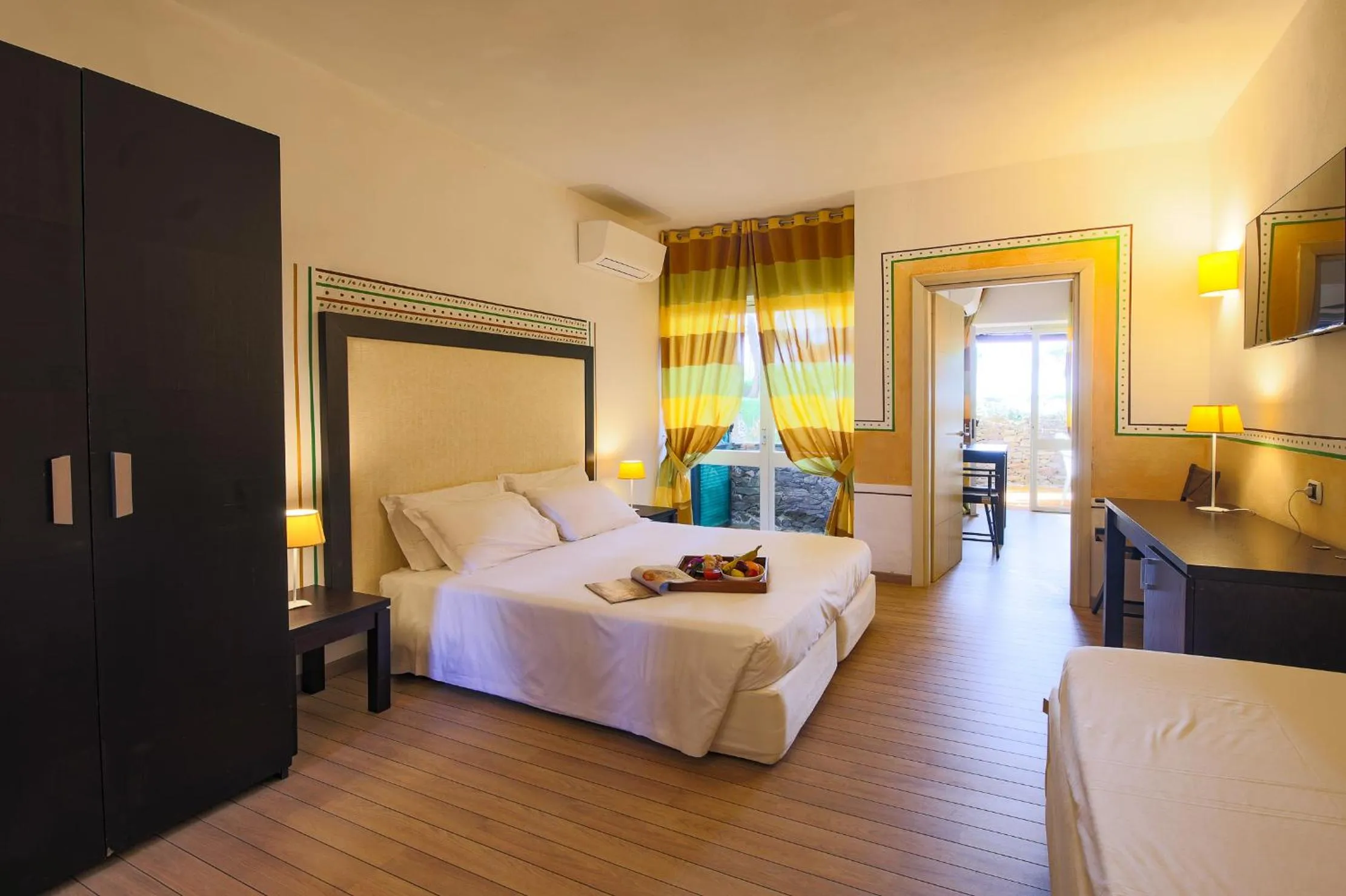 View (from property/room), Bed in UNAHOTELS Club Hotel Ancora