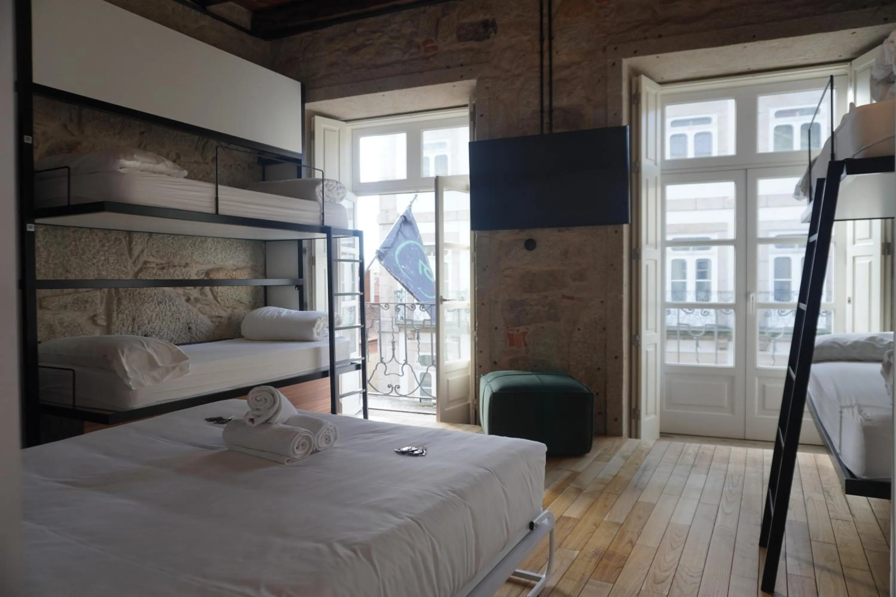 Bed in The Central House Porto Ribeira