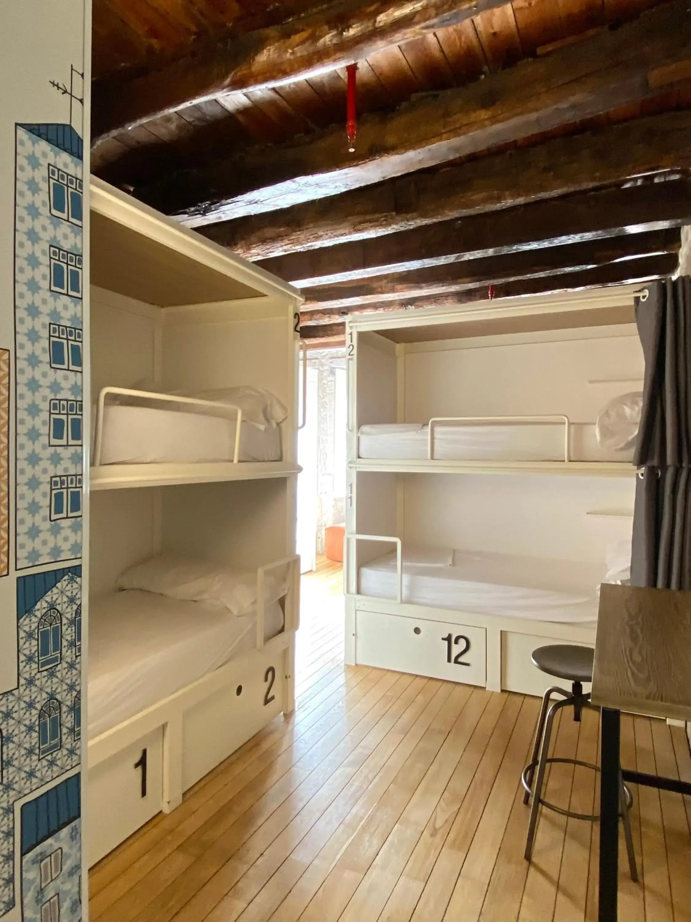 Bed in 12-Bed Mixed Dormitory Room with Private Bathroom in The Central House Porto Ribeira Bed in 12-Bed Mixed Dormitory Room with Private Bathroom in The Central House Porto Ribeira