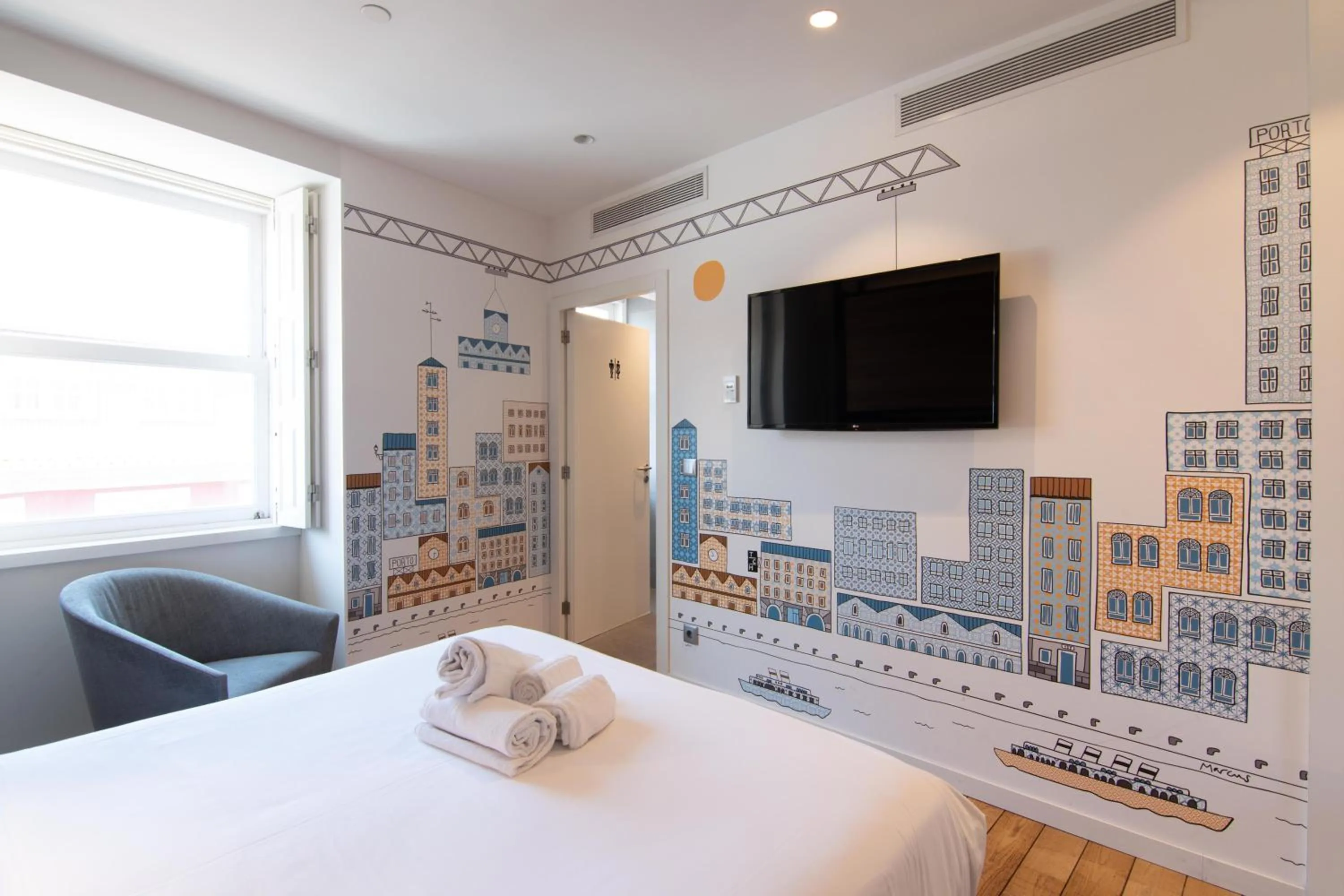 Bed in The Central House Porto Ribeira