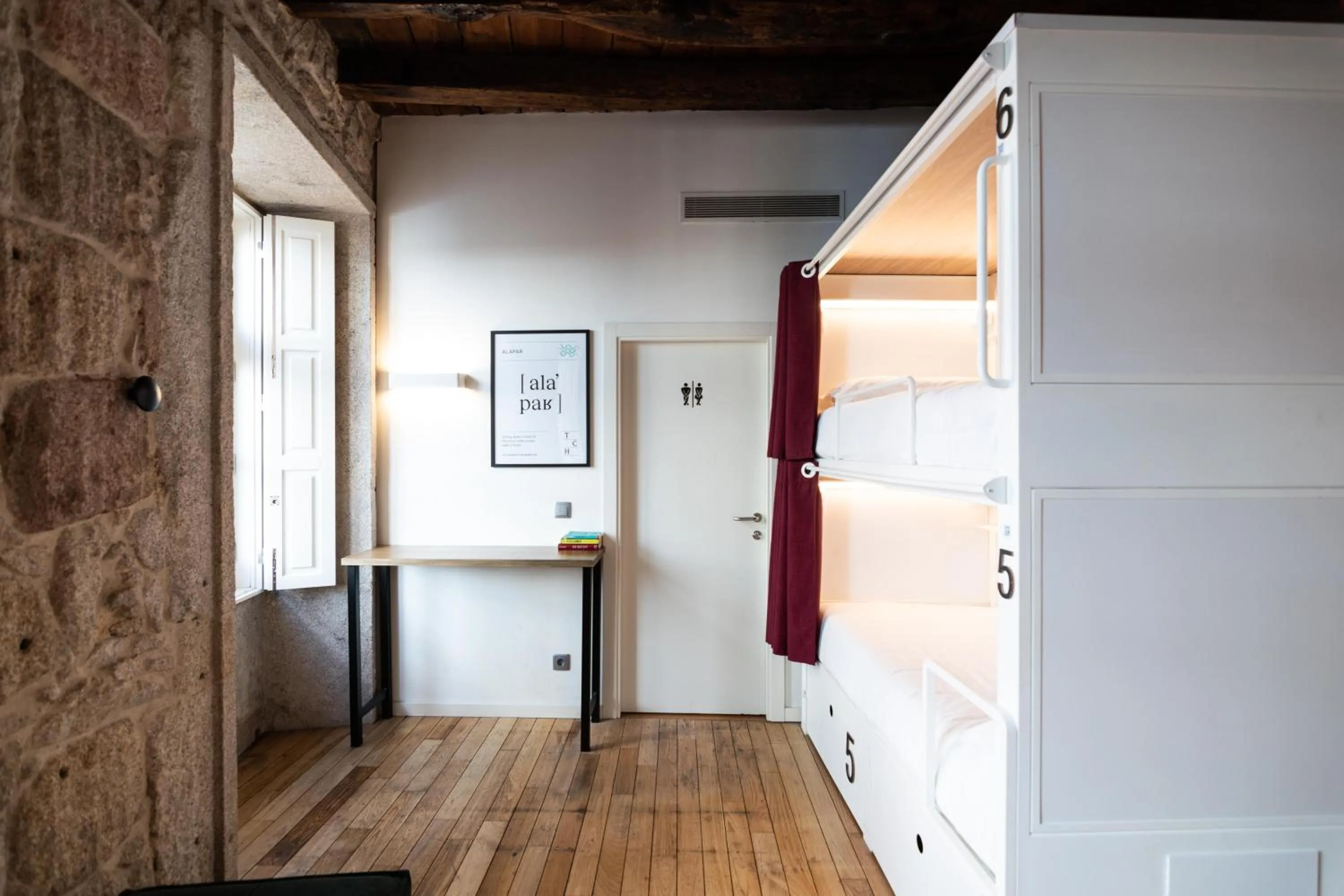 Bed in The Central House Porto Ribeira