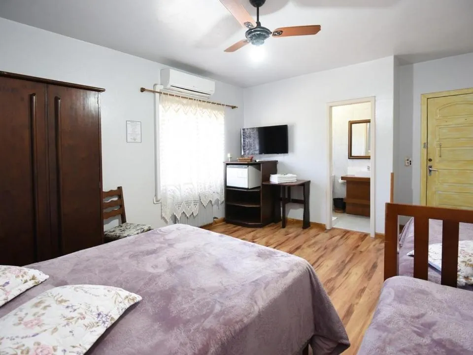 Bed in Hotel Pequenino