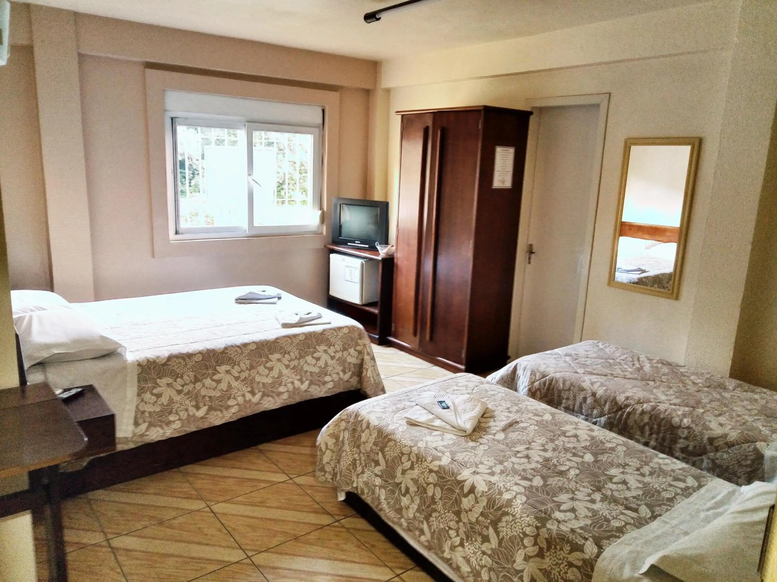 Bed in Hotel Pequenino