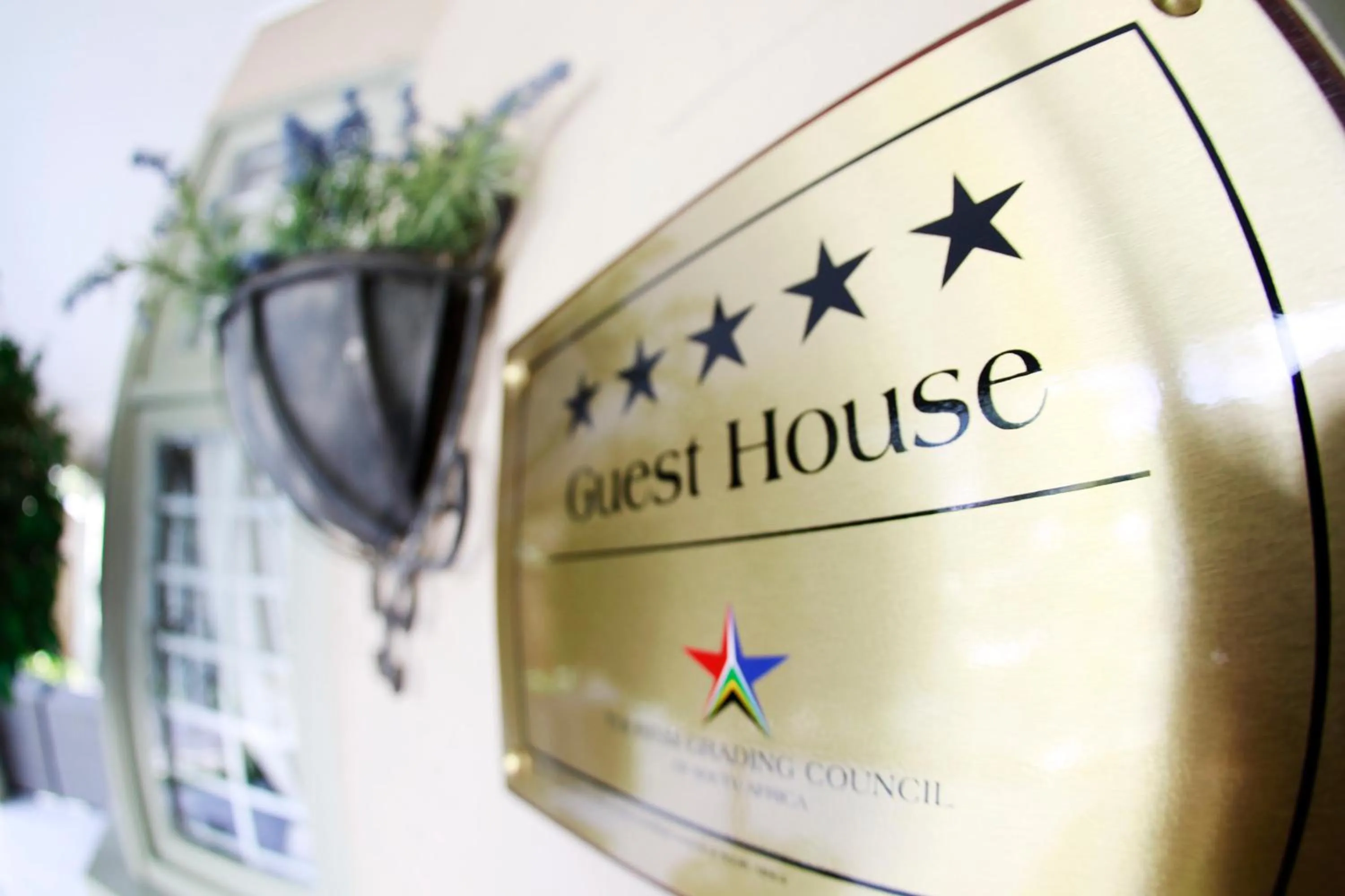 Property logo or sign in Oleander Guest House