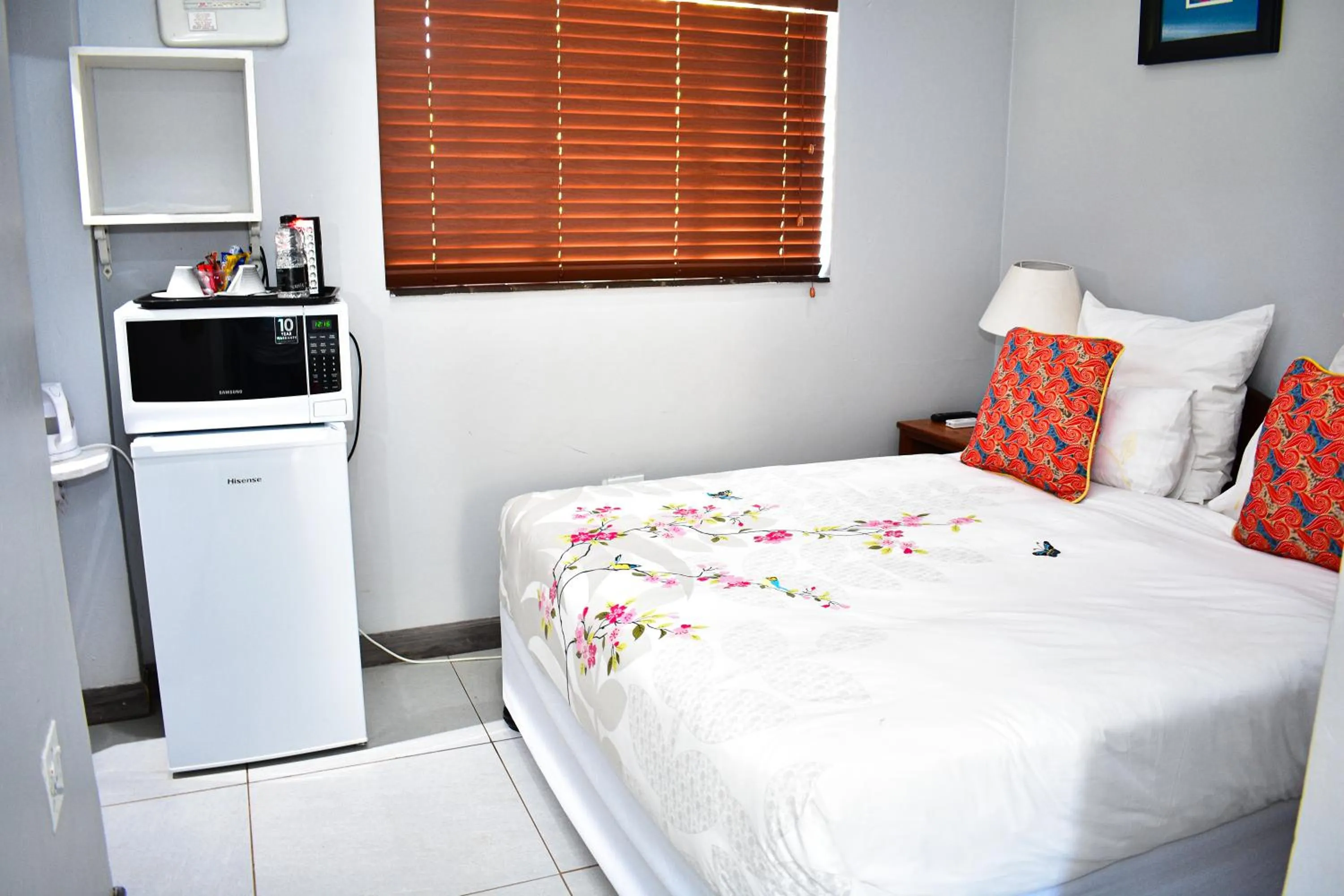 Bed in Heroes Garden Lodge