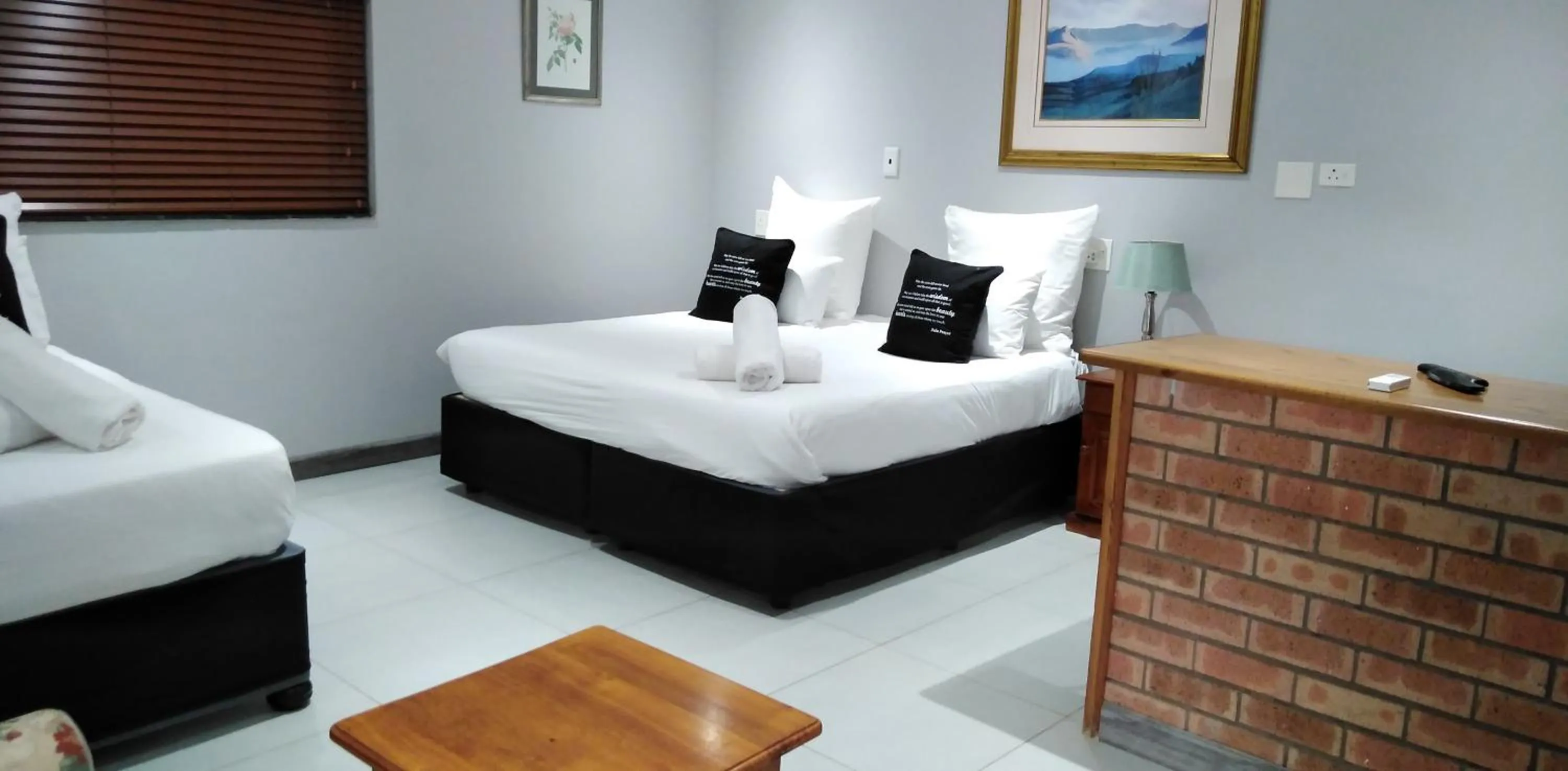 Bed in Heroes Garden Lodge