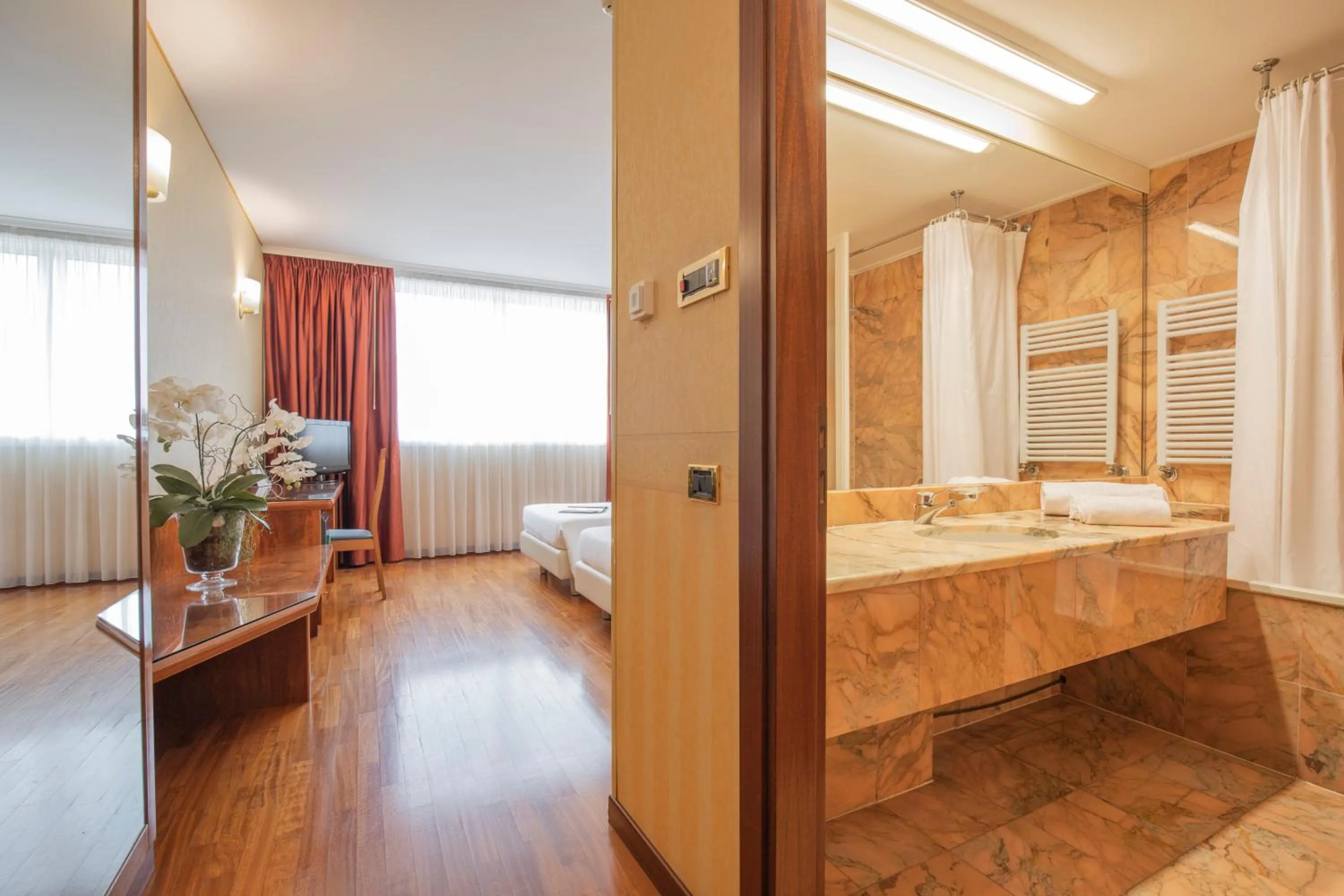 Bed in Montresor Hotel Tower