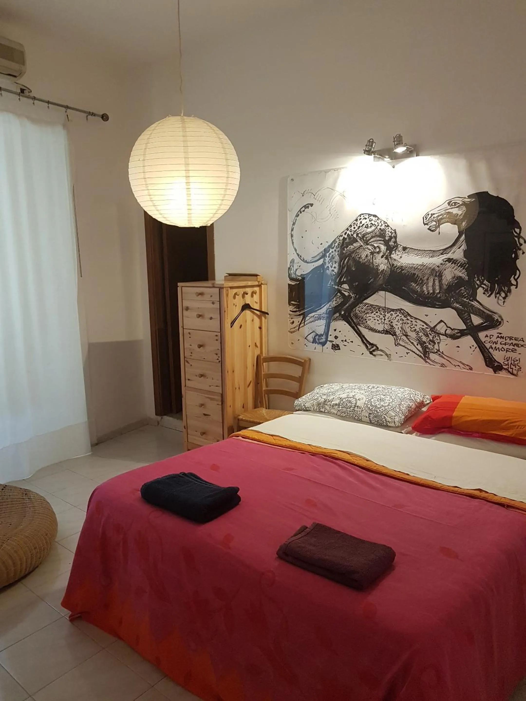 Photo of the whole room in Buonanotte & Buongiorno Guesthouse