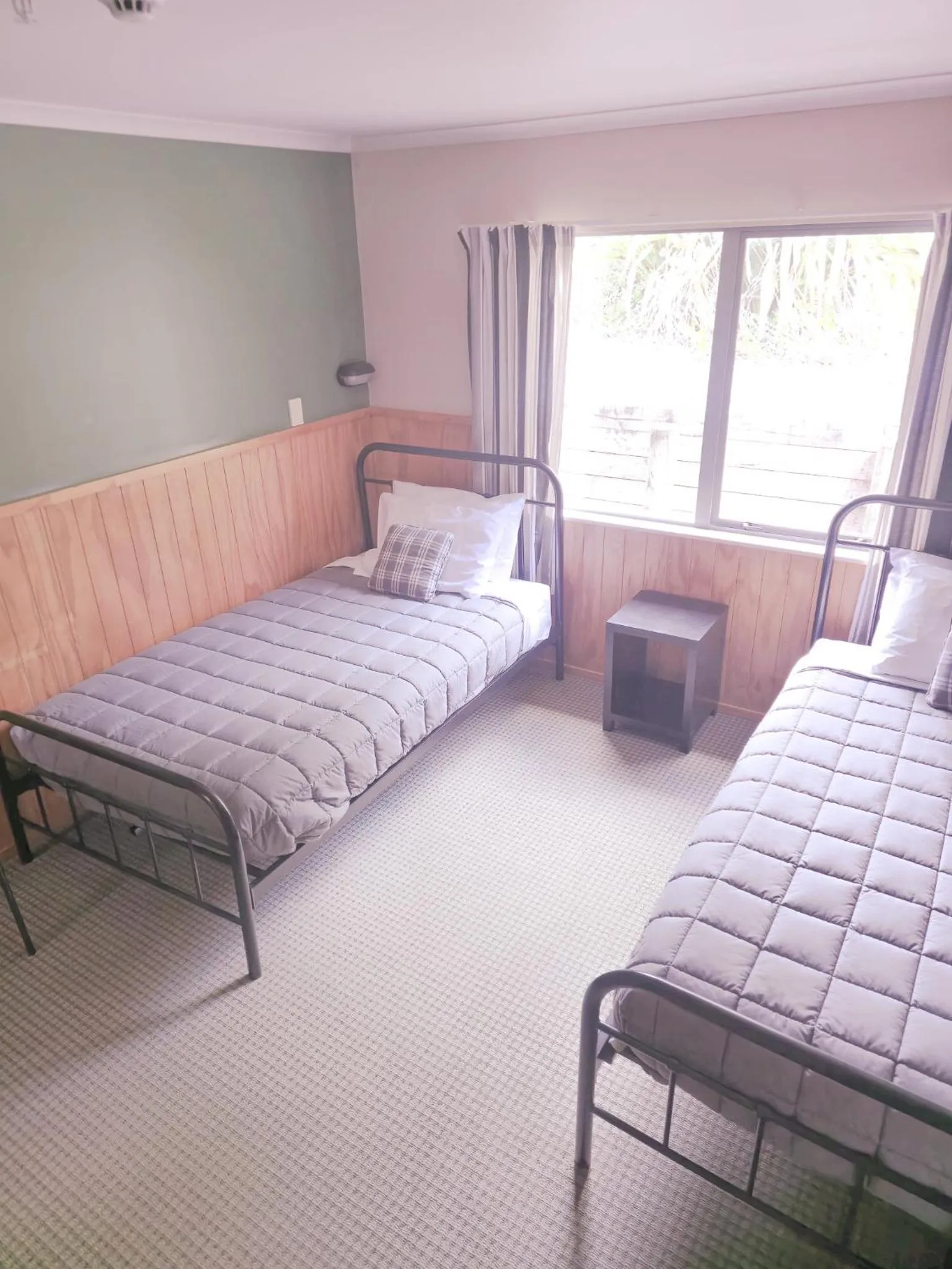 Photo of the whole room, Bed in Waitomo Village Chalets home of Kiwipaka