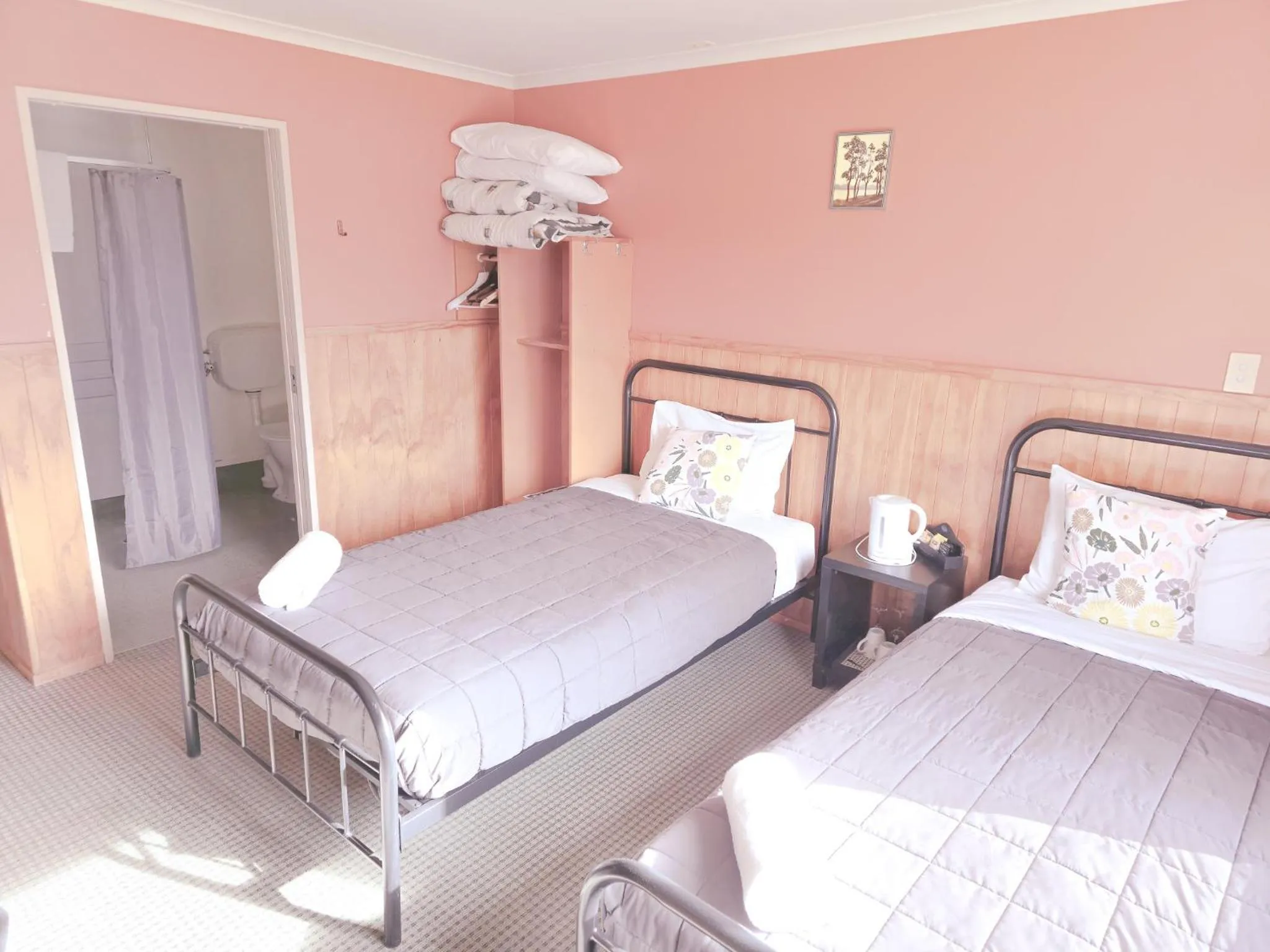 Photo of the whole room, Bed in Waitomo Village Chalets home of Kiwipaka