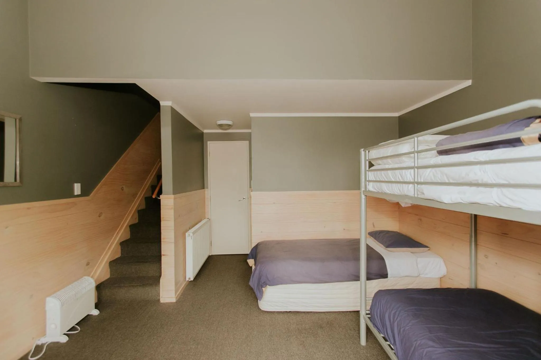 Bedroom, Bed in Waitomo Village Chalets home of Kiwipaka