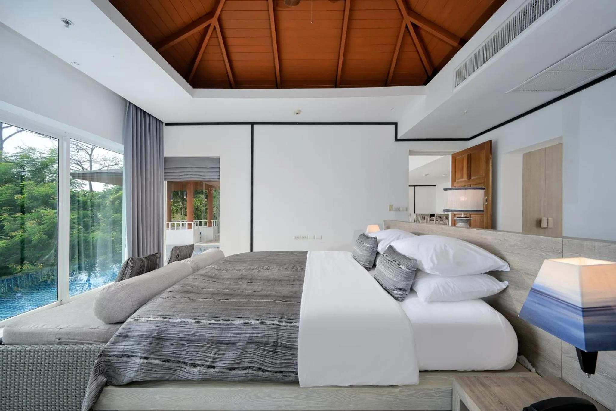 Bed in Andamantra Resort and Villa Phuket