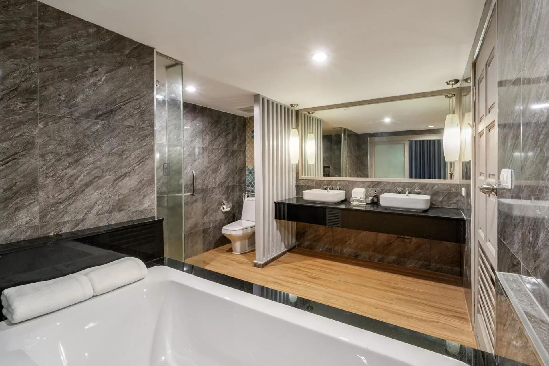 Bathroom, Bed in Andamantra Resort and Villa Phuket