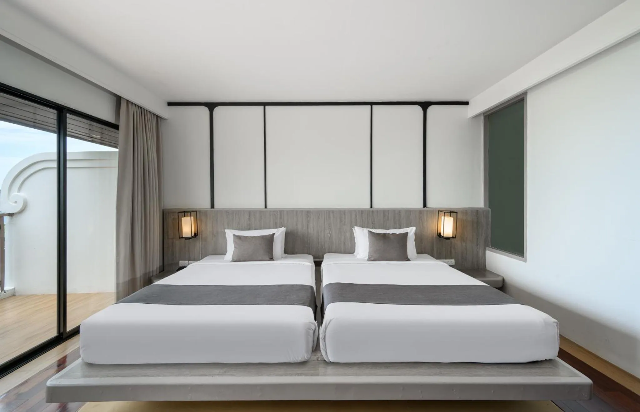 Bed in Andamantra Resort and Villa Phuket