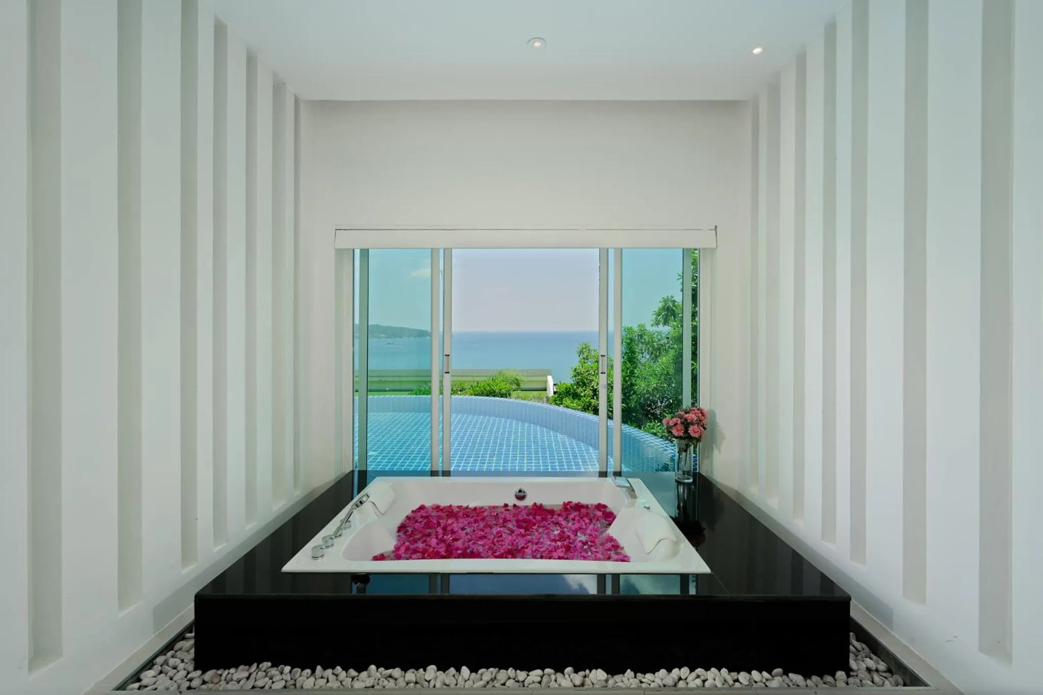 Bathroom, Bed in Andamantra Resort and Villa Phuket