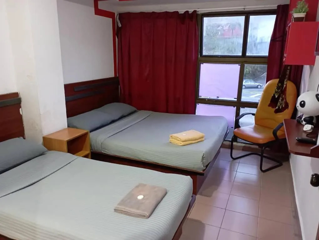 Bed in Evonne Budget Hotel