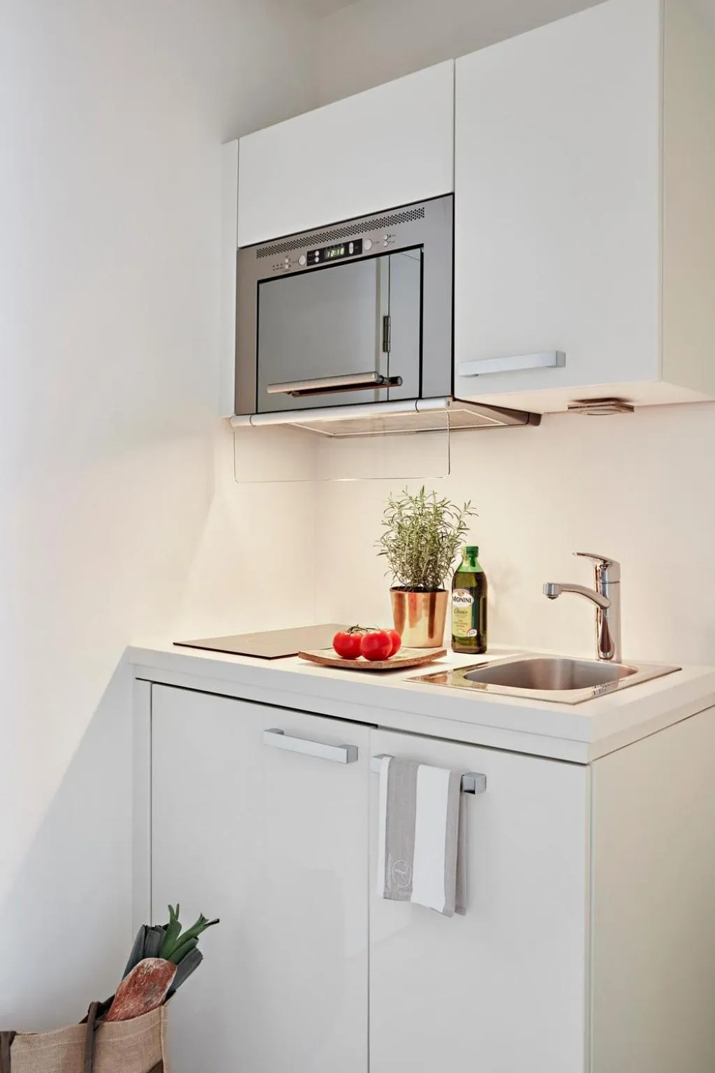 Kitchen or kitchenette in VISIONAPARTMENTS Binzmühlestrasse 46 - contactless check-in