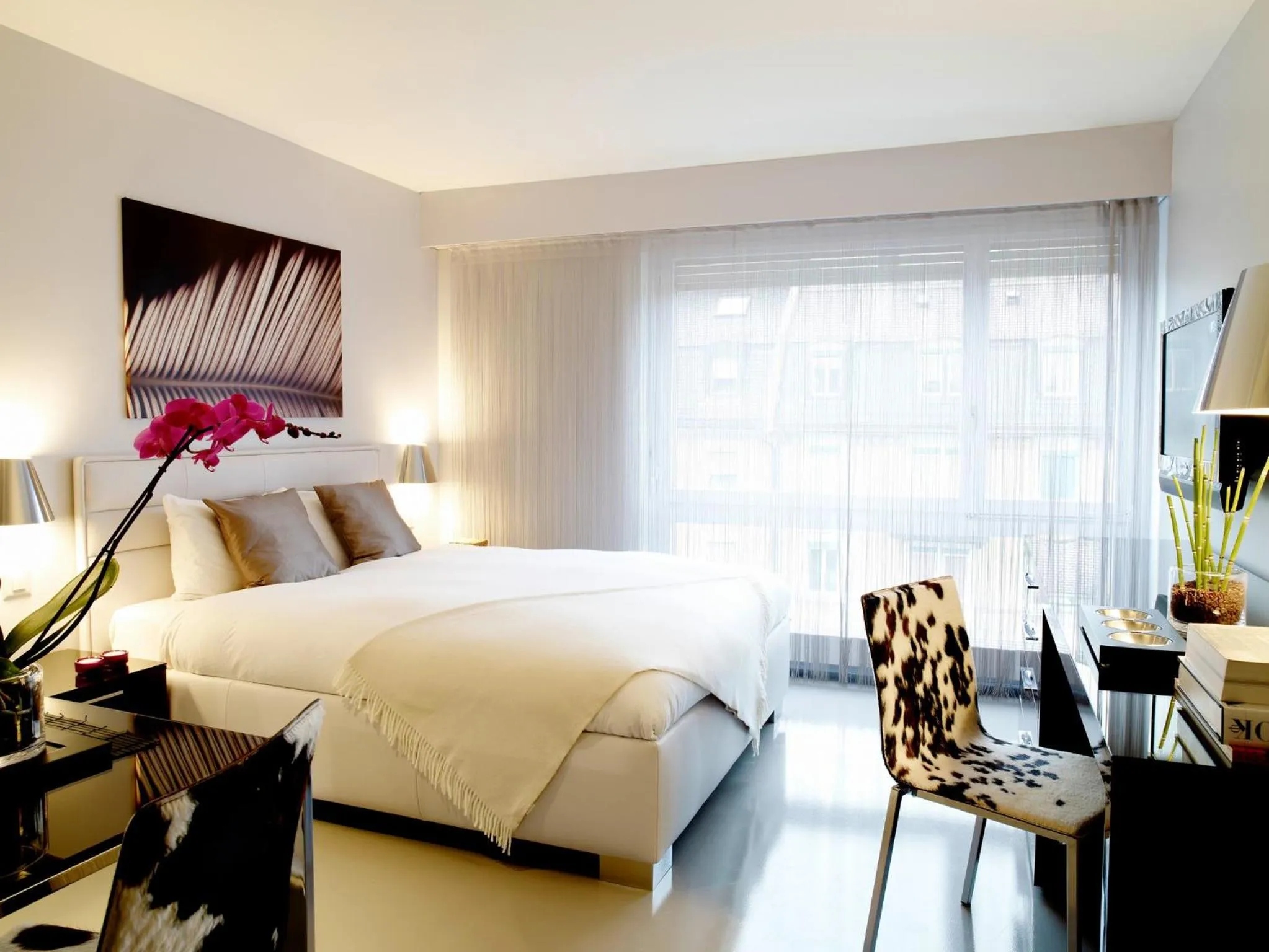 Photo of the whole room, Bed in VISIONAPARTMENTS Binzmühlestrasse 46 - contactless check-in