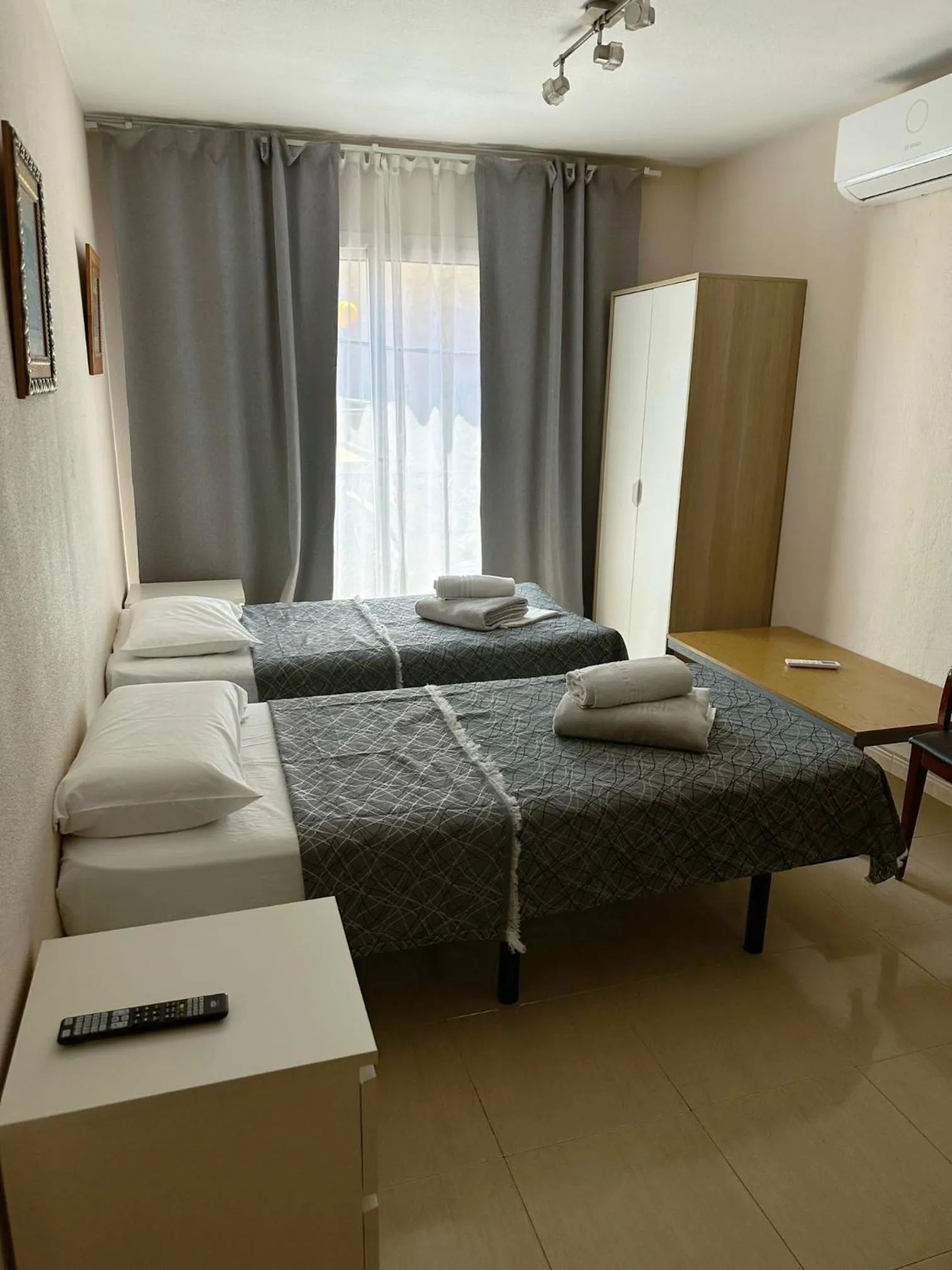 Bed in Royal Inn Aparthotel