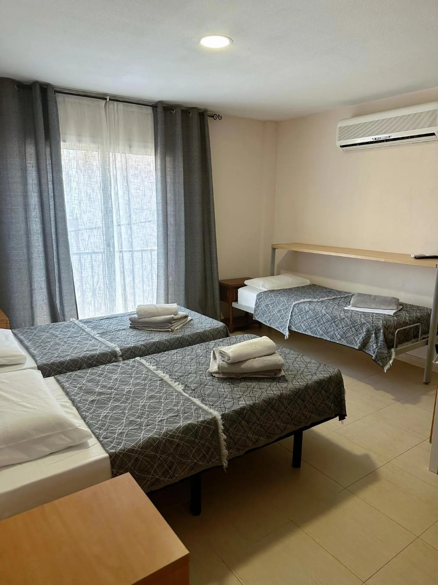 Bed in Royal Inn Aparthotel