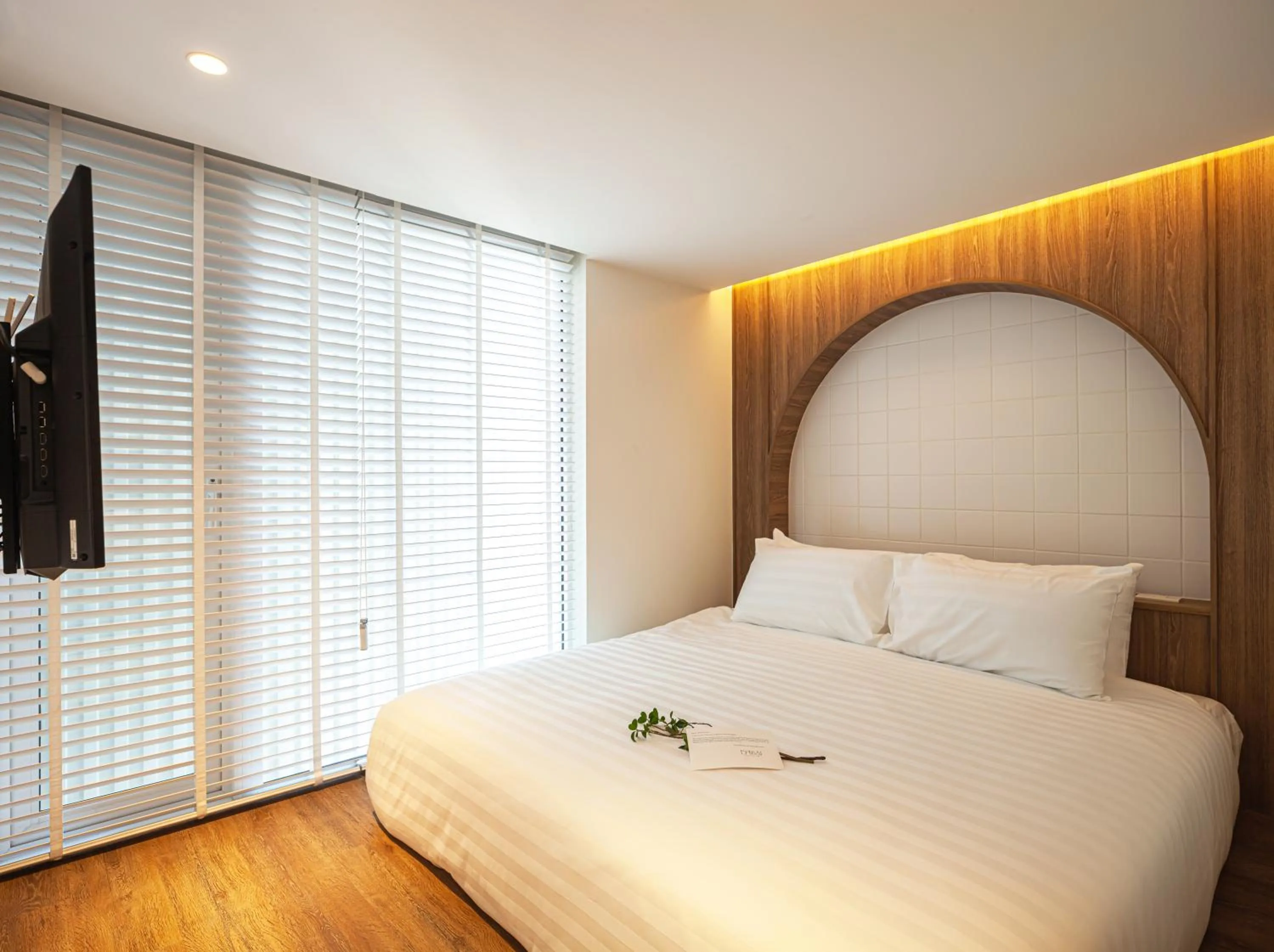 Bed in Bonsai Hotel Bangkok