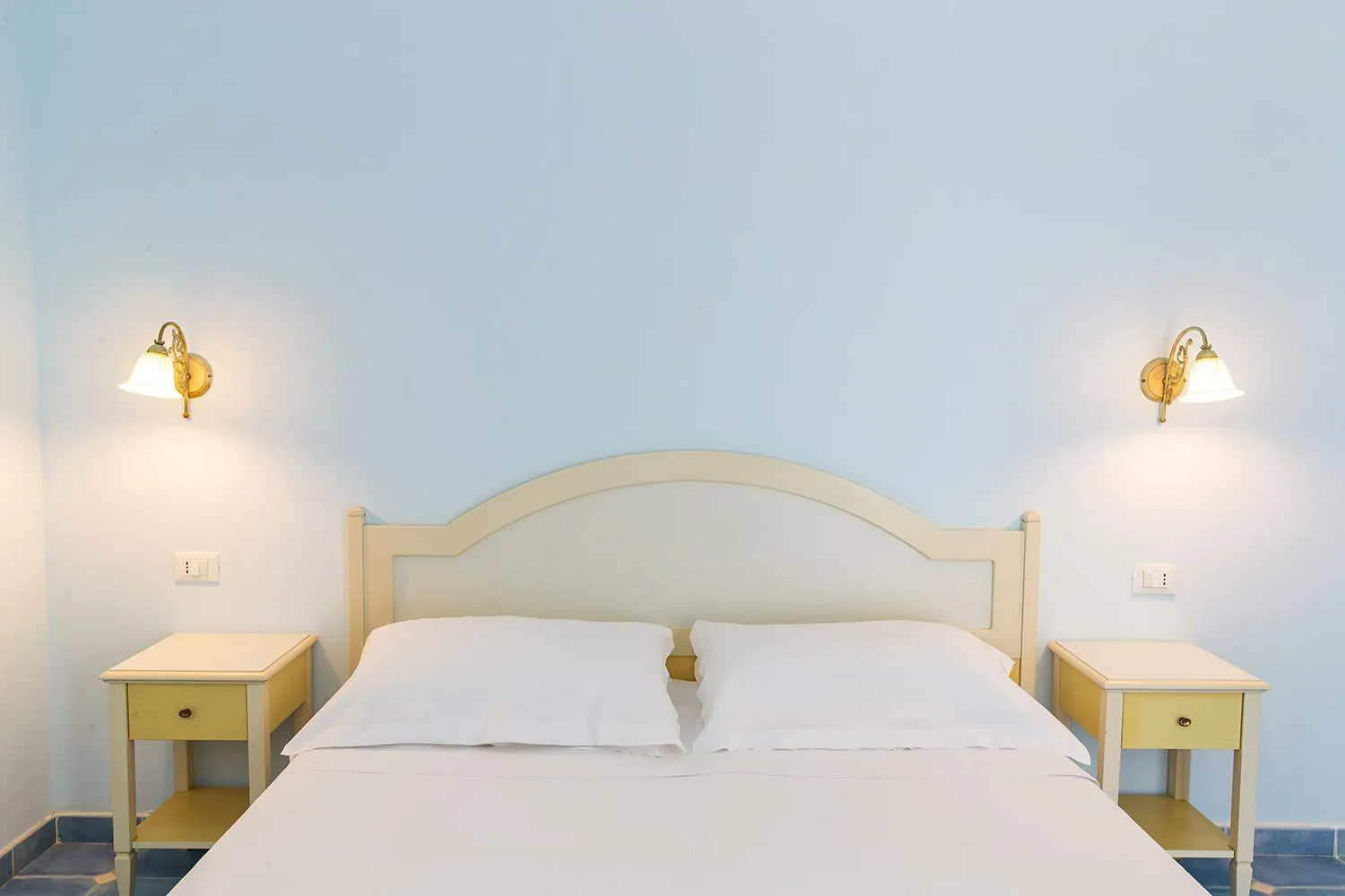 Bed in Baia dei Mulini Resort & Spa