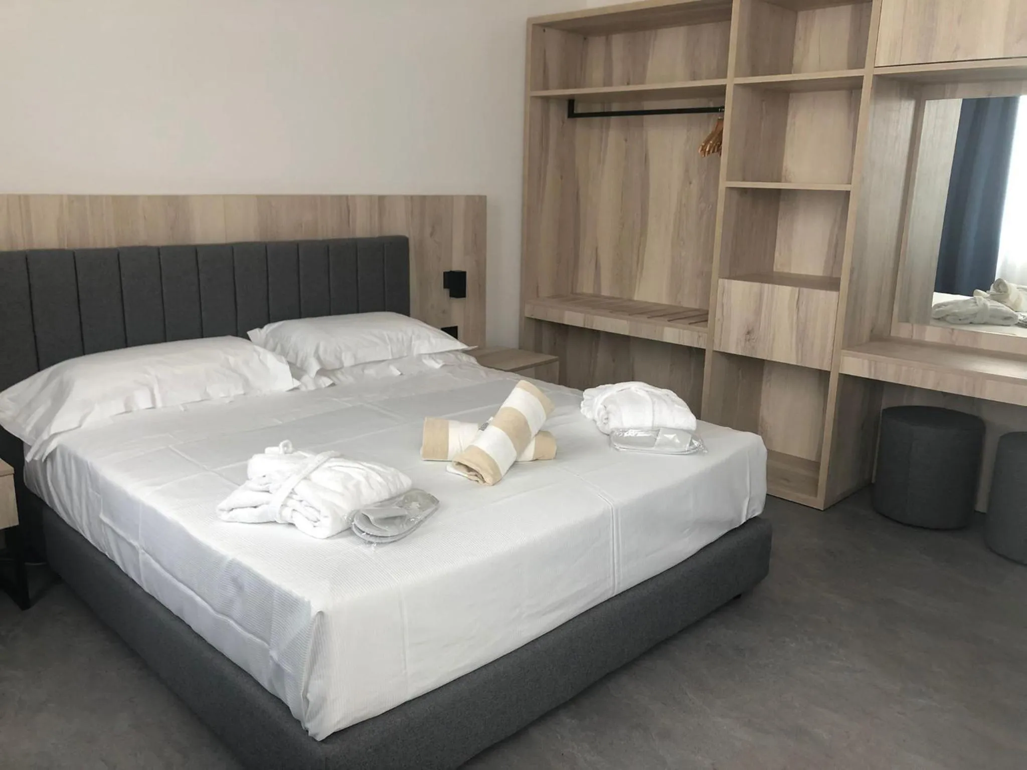 Bed in Baia dei Mulini Resort & Spa