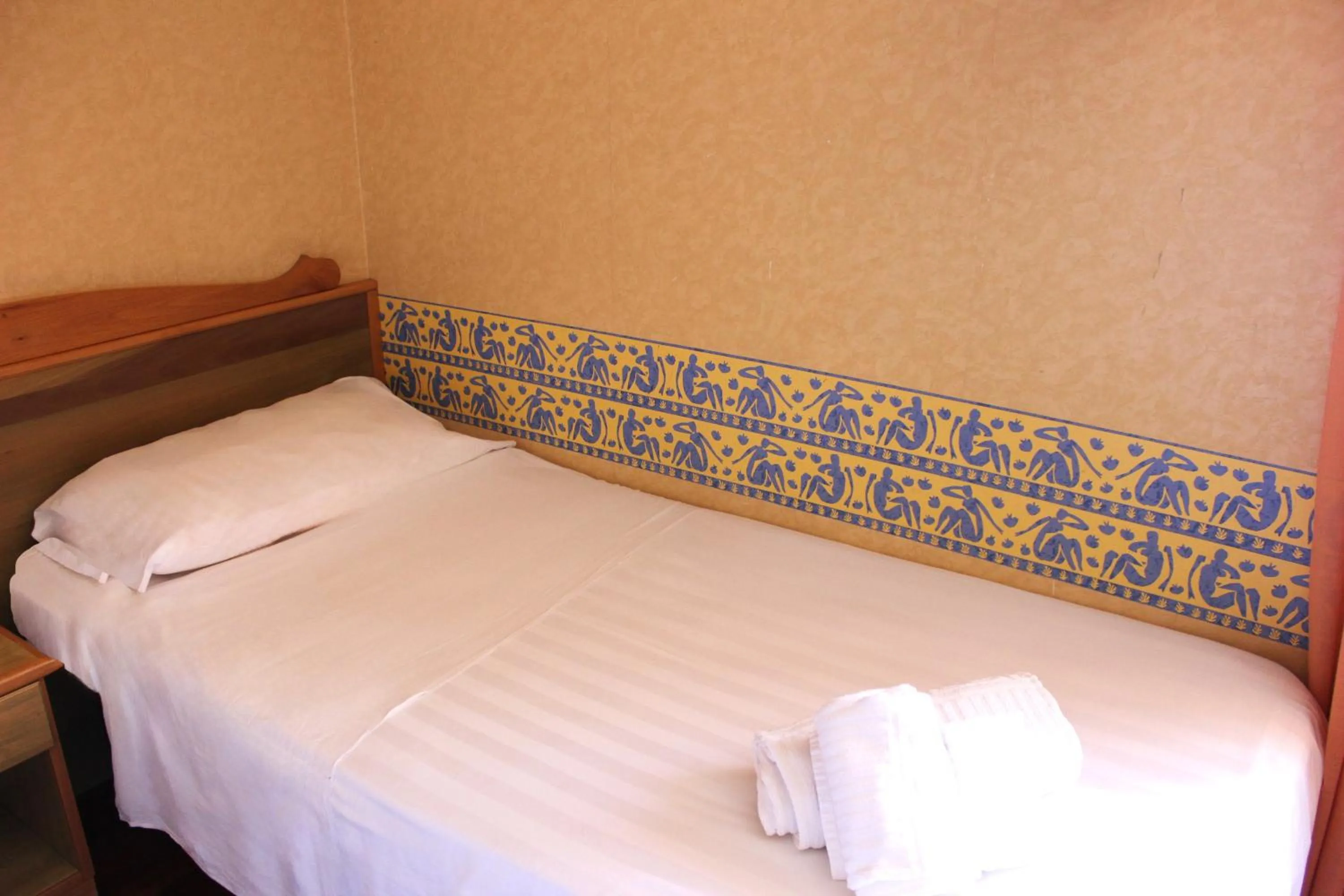 Bed in Phi Hotel Ambra