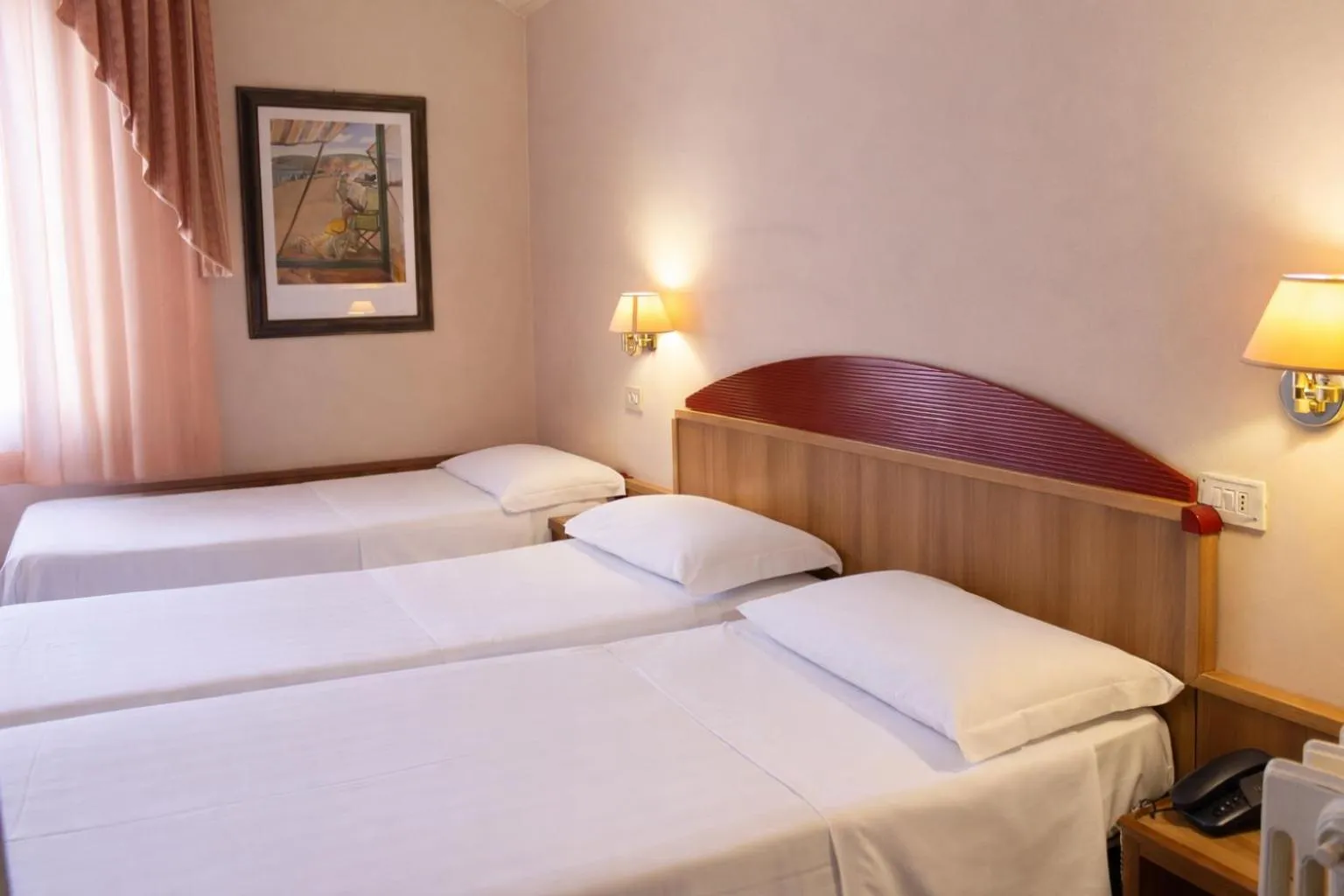 Bed in Phi Hotel Ambra