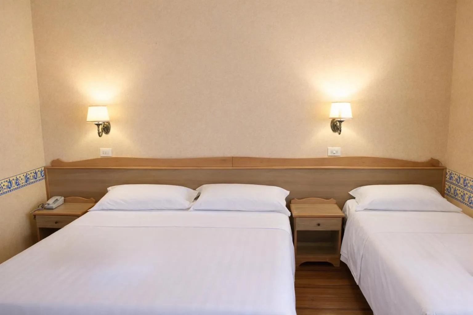 Bed in Phi Hotel Ambra