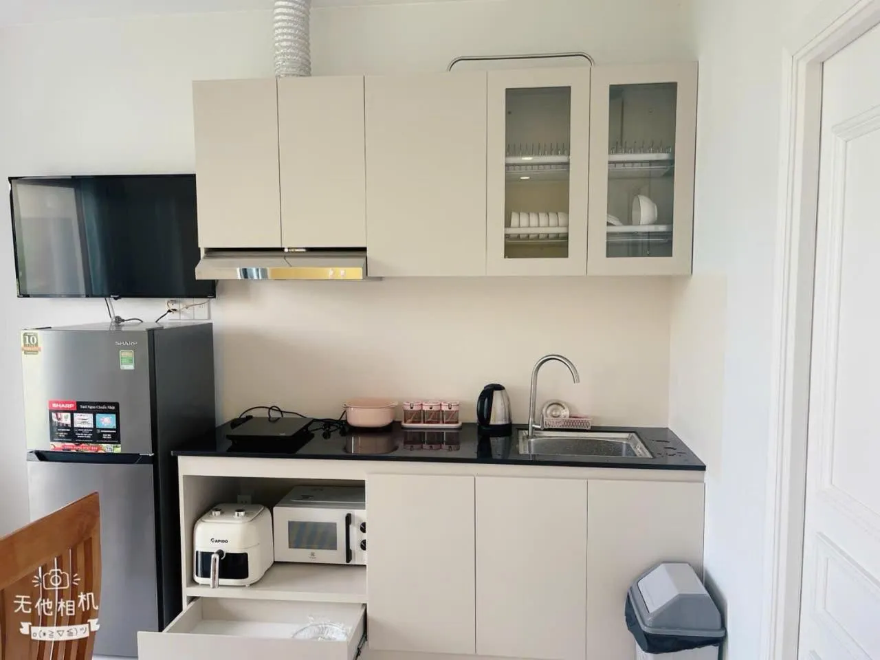 Kitchen or kitchenette in Ngân Hà Star Homestay - Grand World Phú Quốc