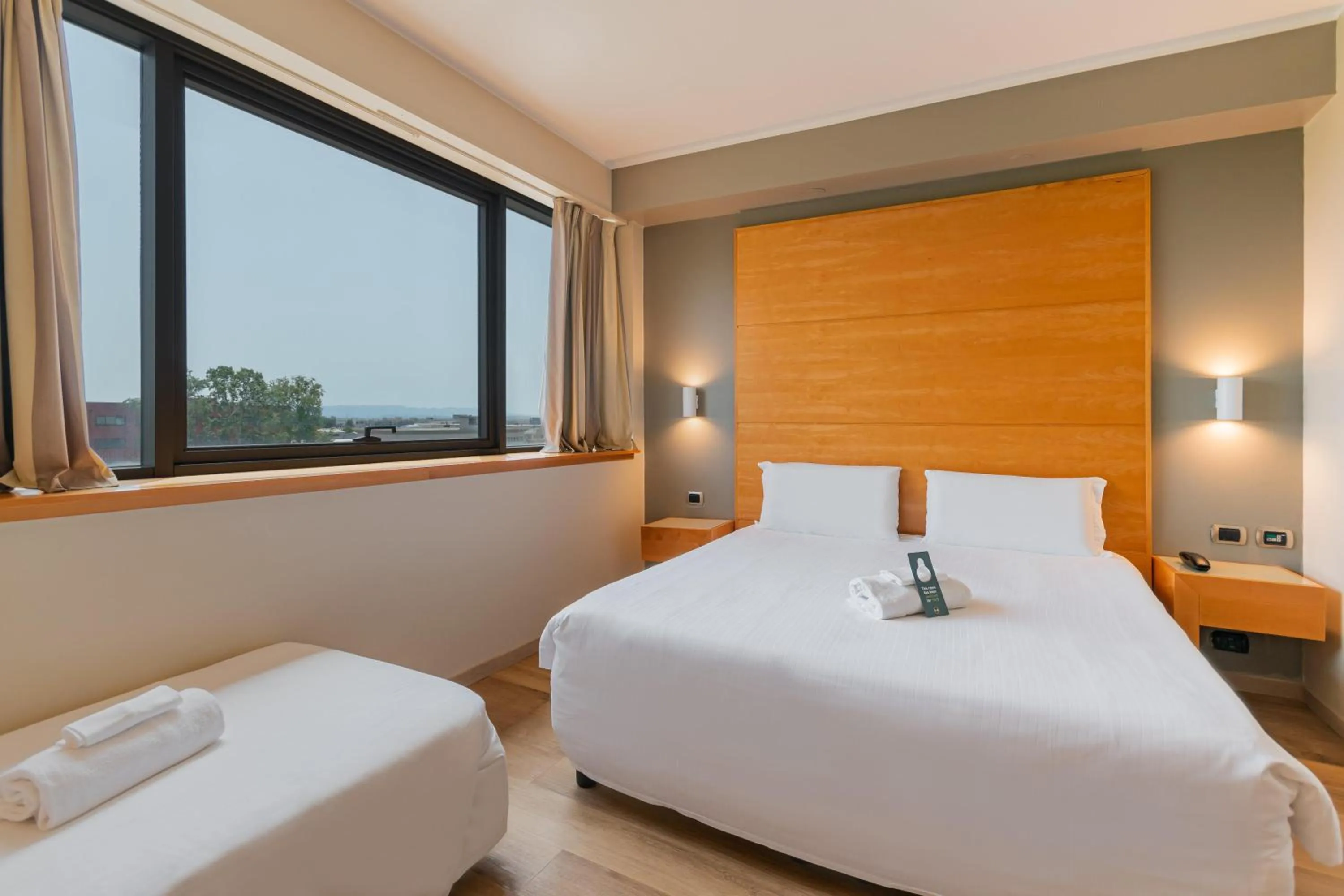 Photo of the whole room, Bed in B&B HOTEL Pisa Airport