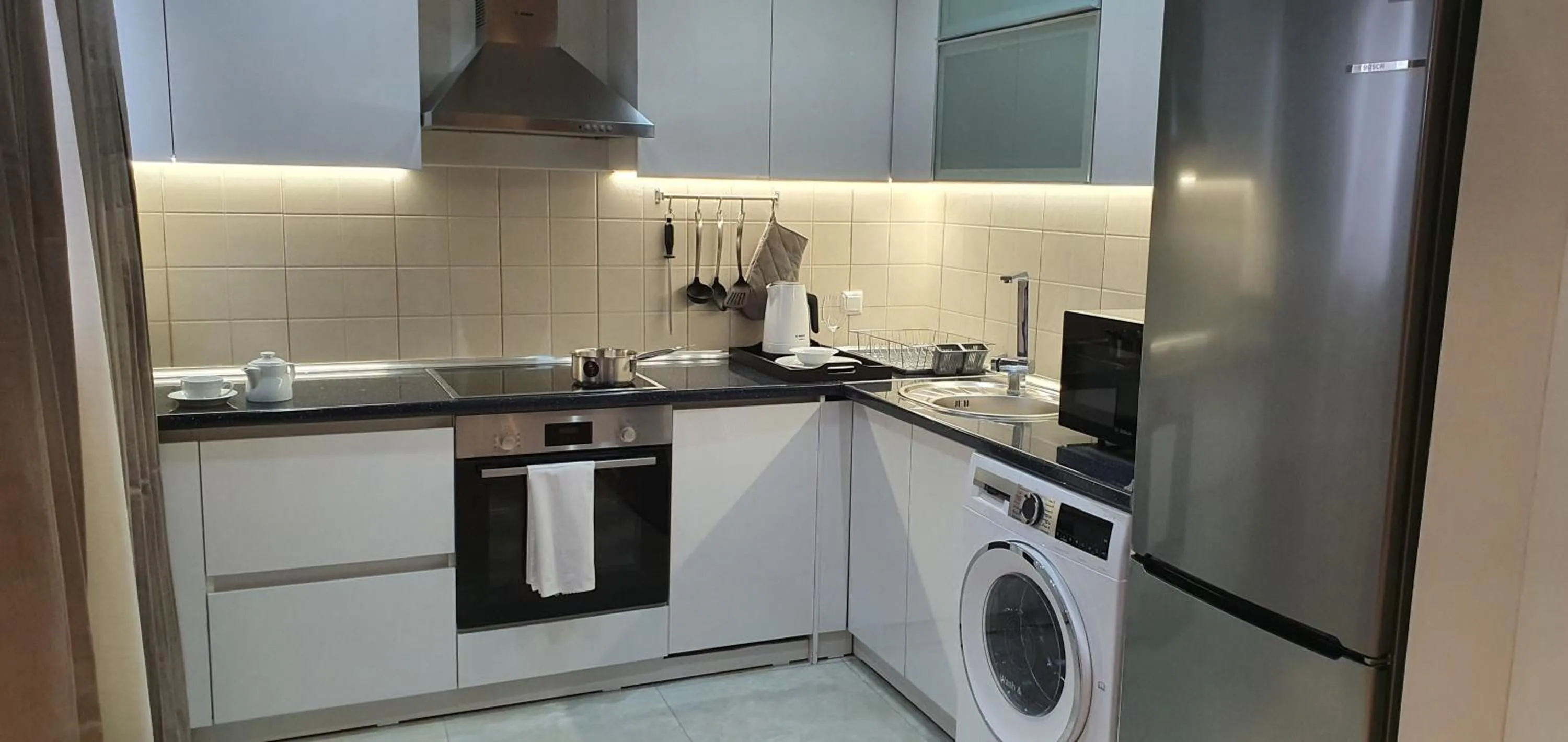 Kitchen or kitchenette in Somerset City Centre Atyrau