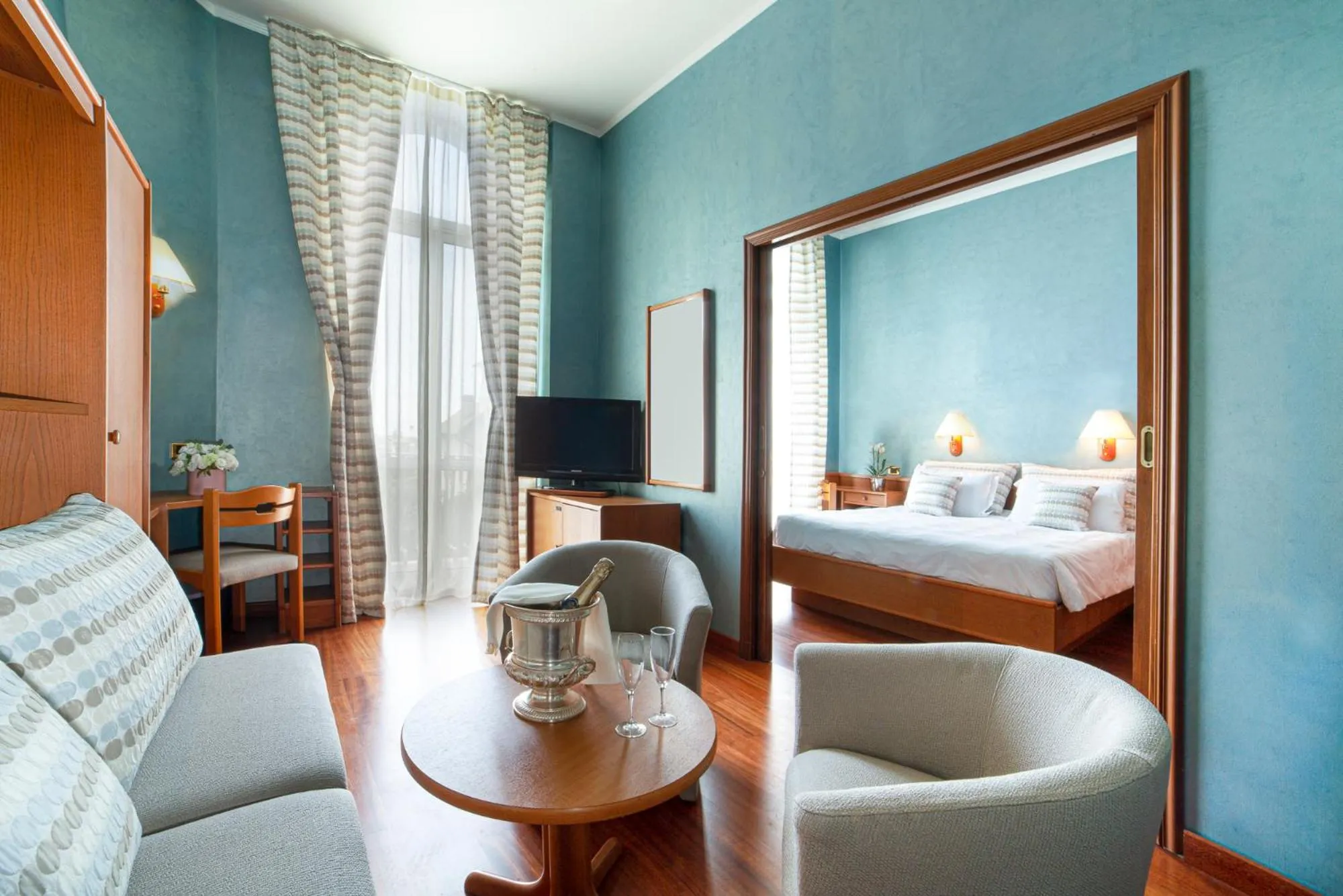 Living room, Bed in Hotel Villa Elisa & Spa