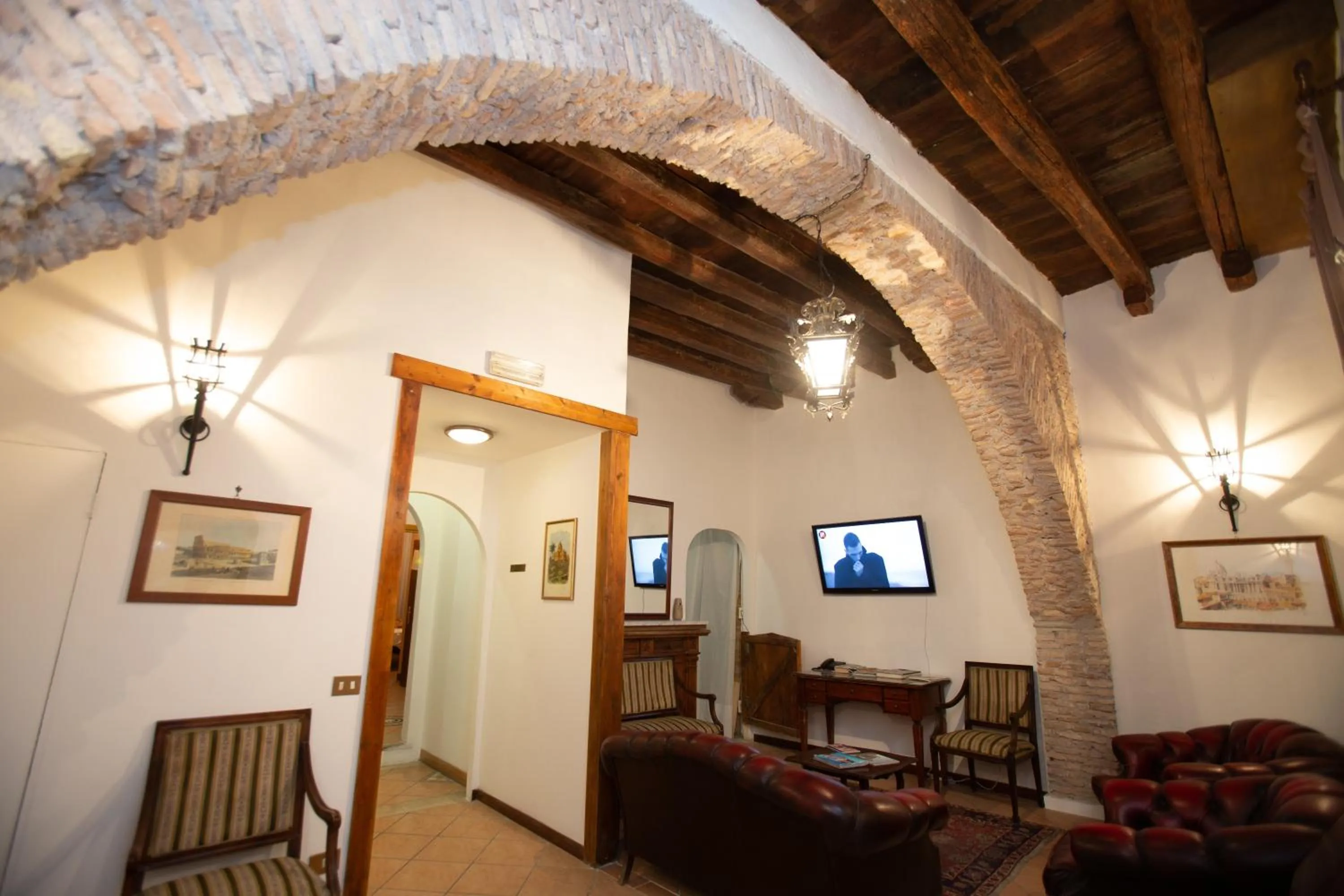 Communal lounge/ TV room, Seating Area in Hotel Giubileo