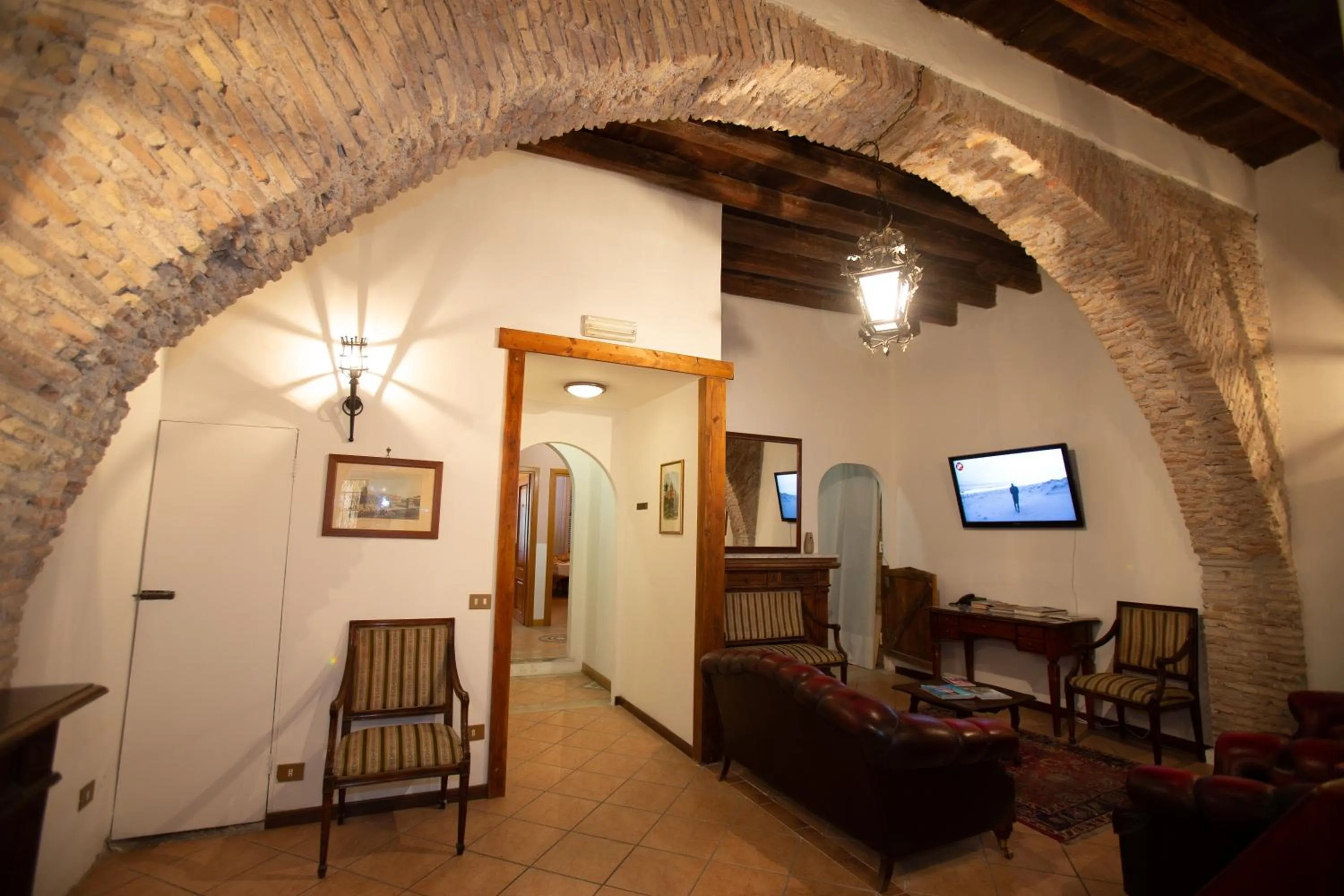 Communal lounge/ TV room, Seating Area in Hotel Giubileo