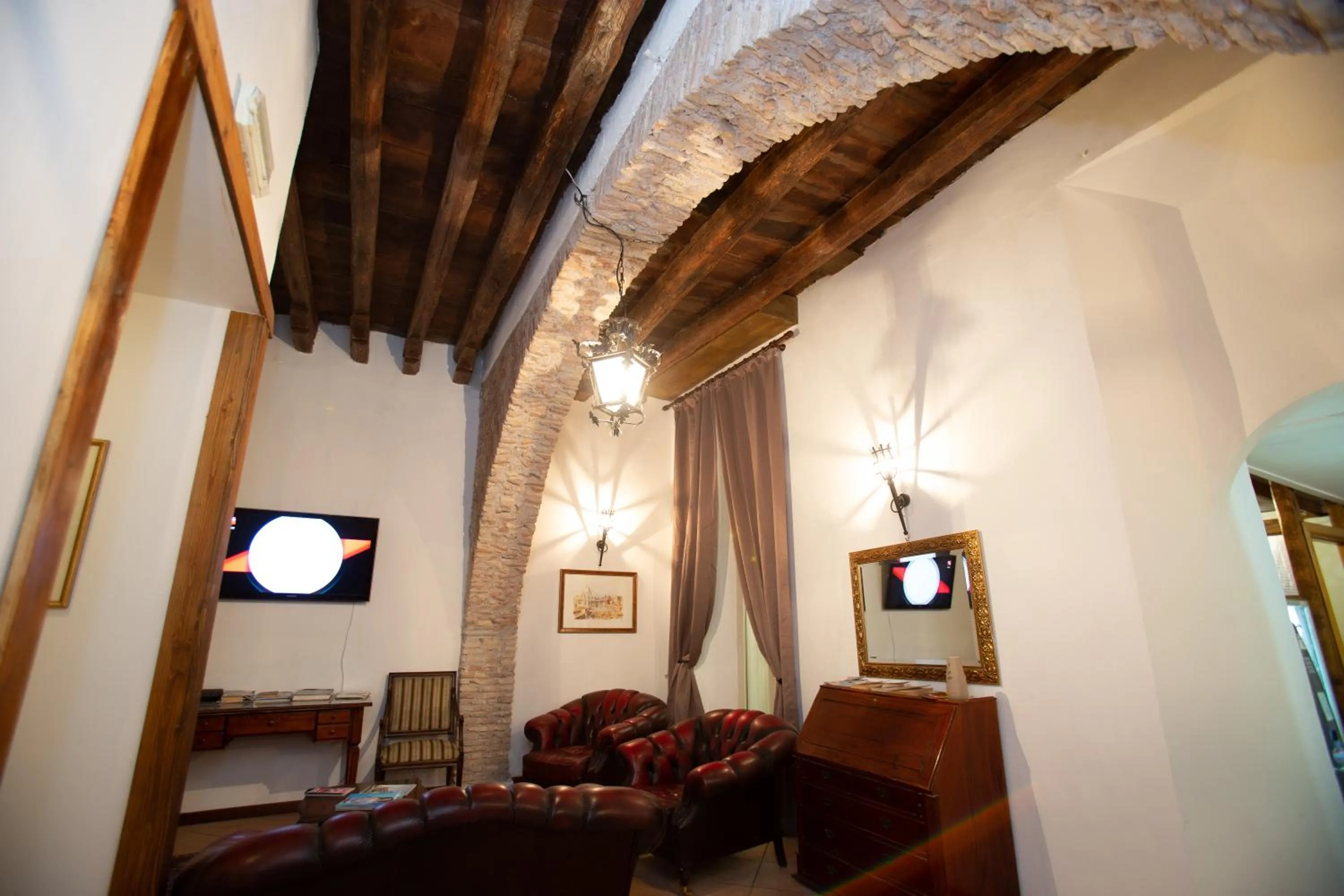 Communal lounge/ TV room, Seating Area in Hotel Giubileo