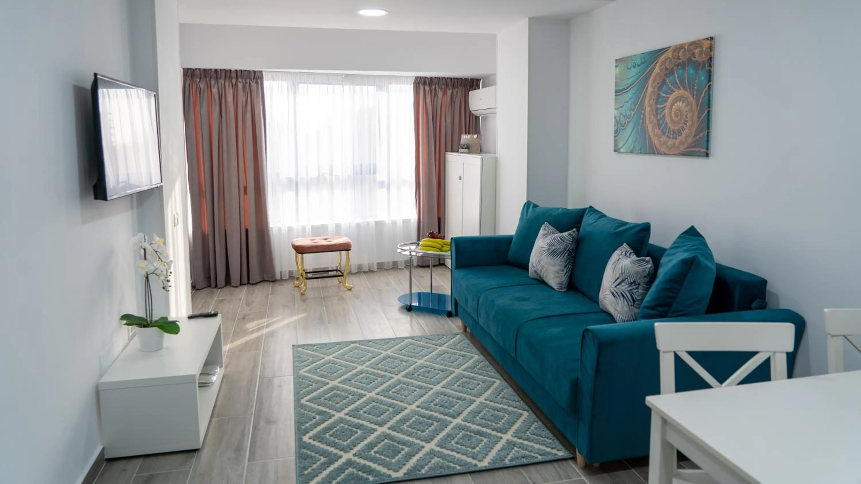 Seating area in Sea View Apartments Olimp - Avenue Hotels