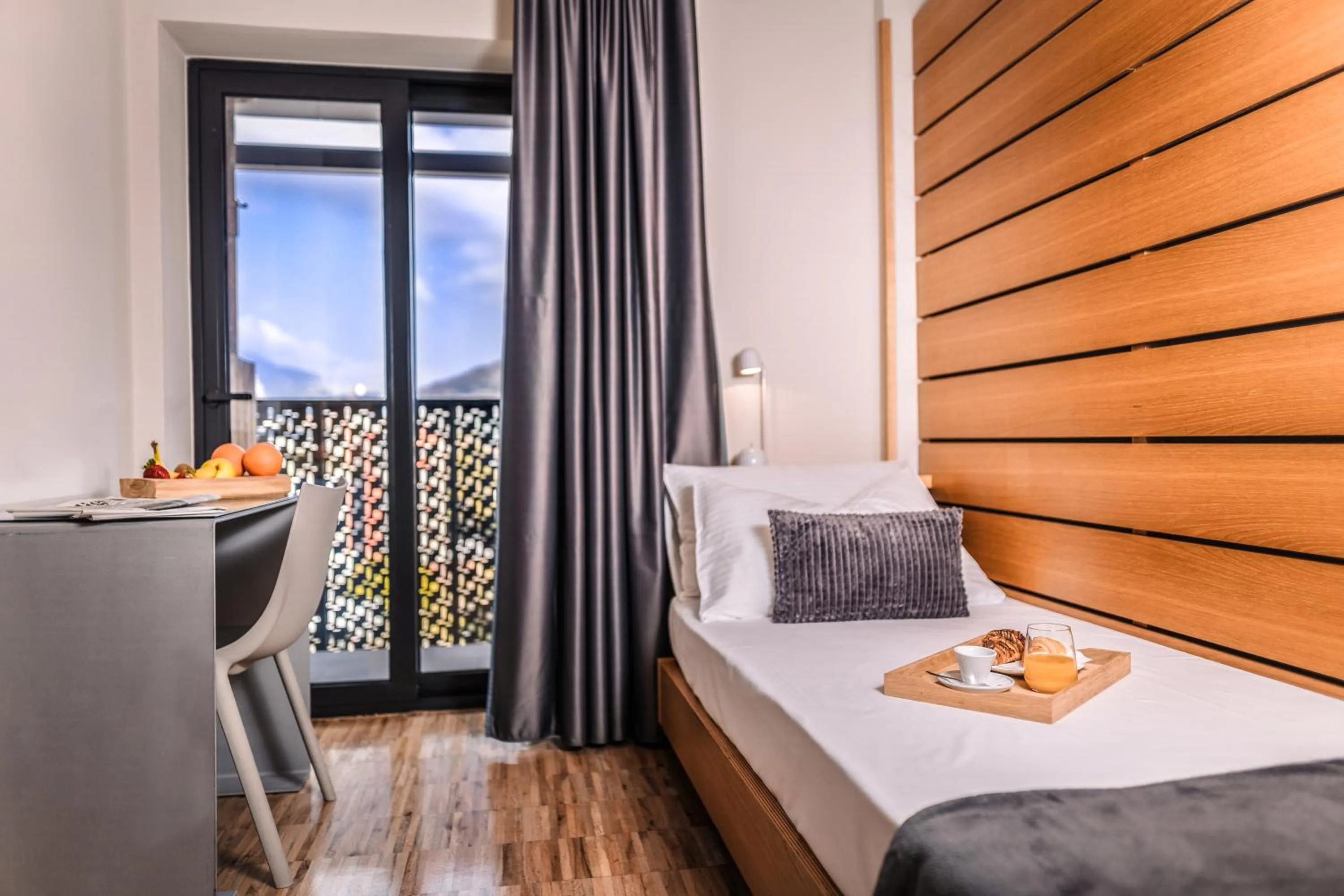 Bed in Lake Front Hotel Mirage