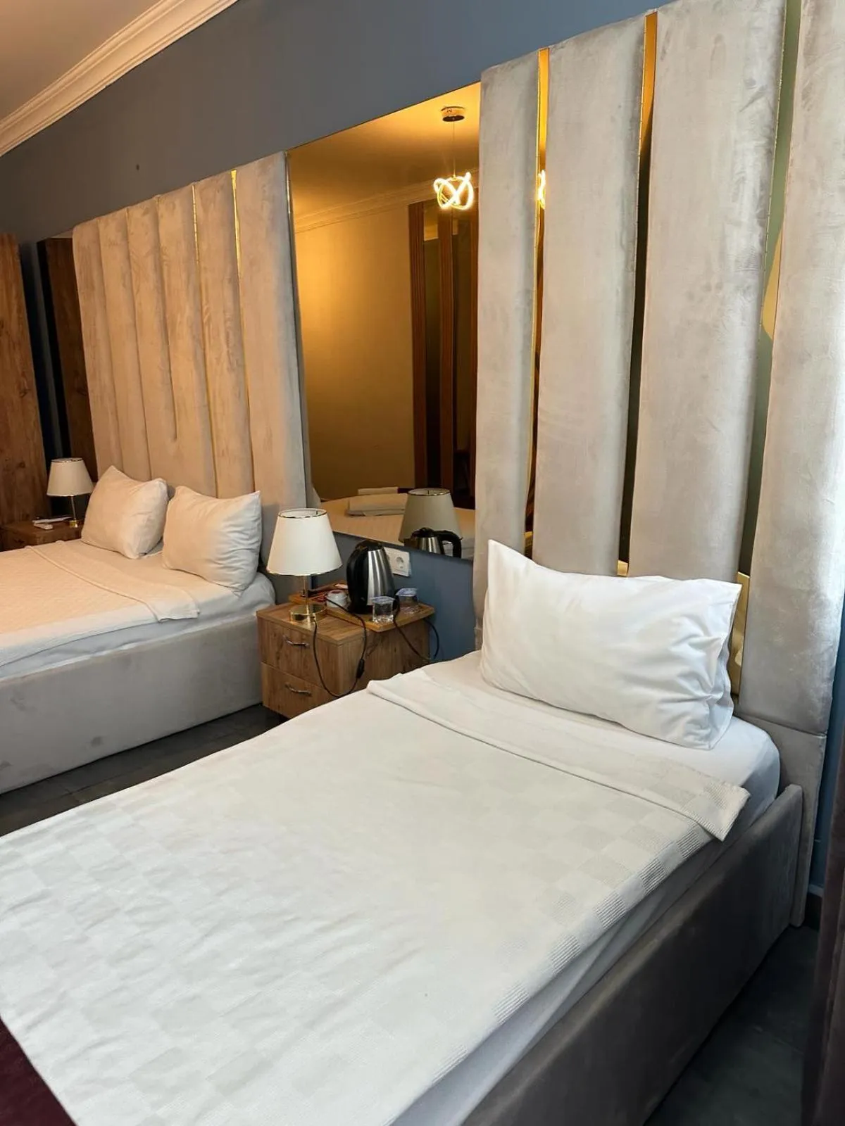 Bed in Grand Niki Hotel & Spa