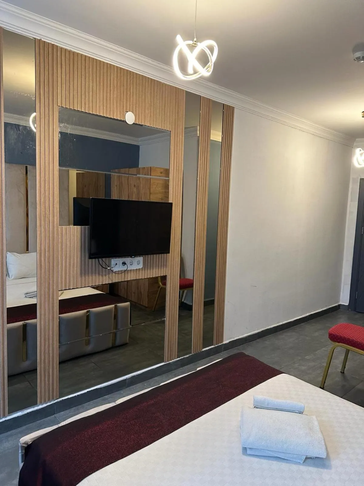 Bed in Grand Niki Hotel & Spa