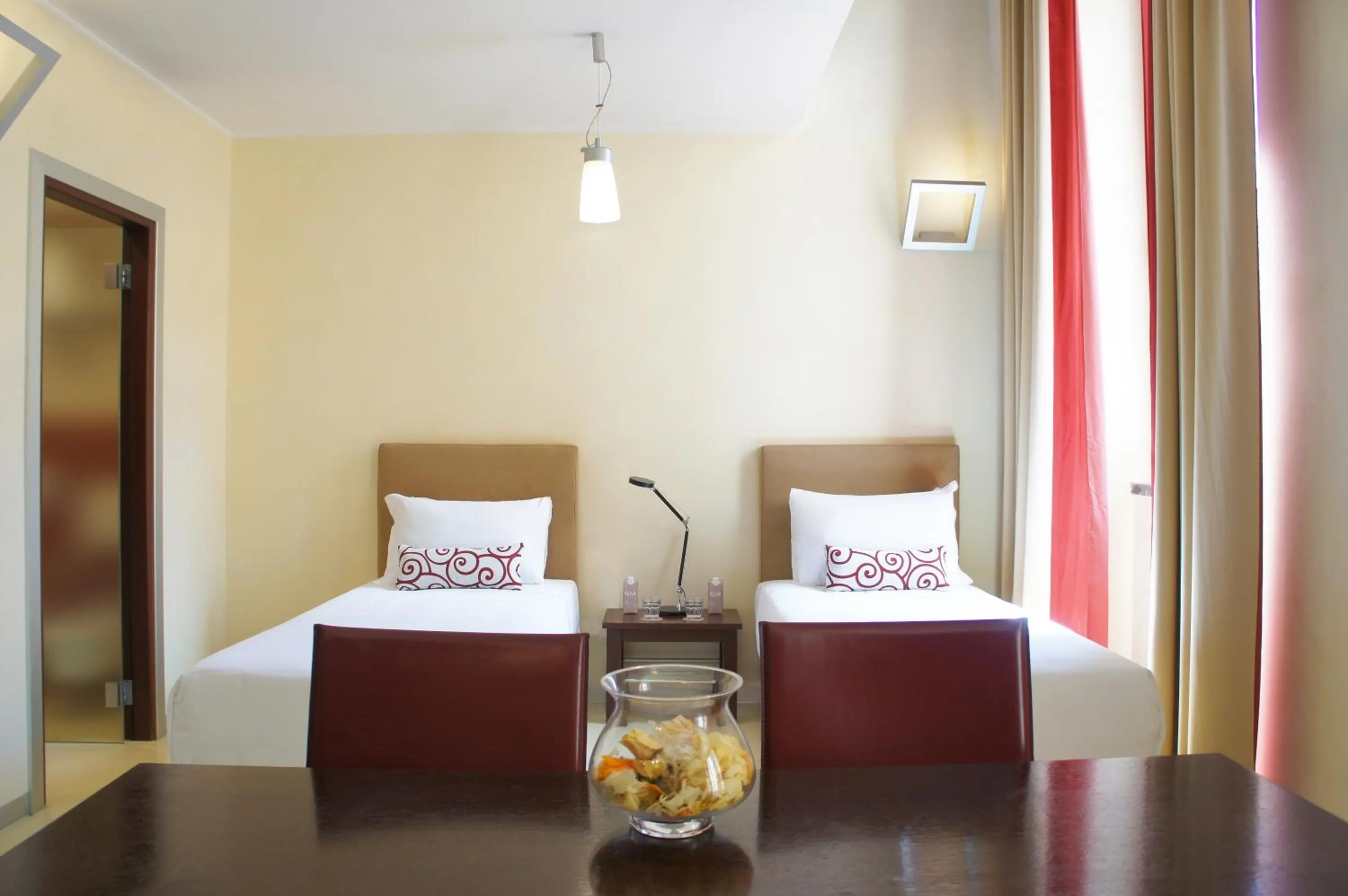 Bed in La Griffe Hotel Roma