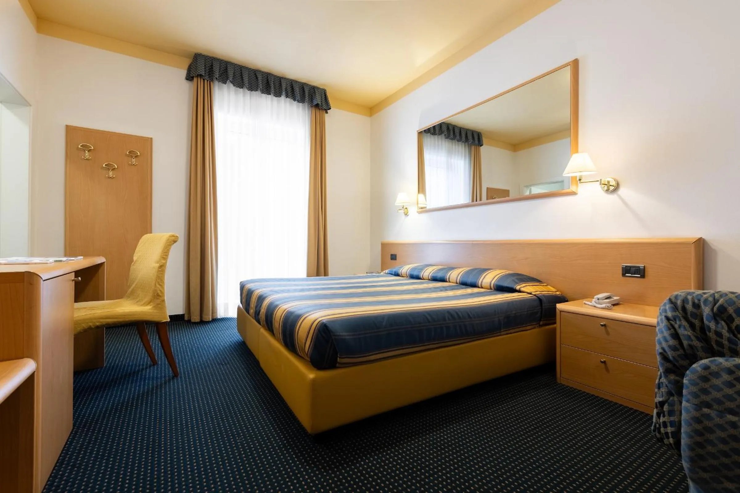 Photo of the whole room, Bed in Brione Green Resort