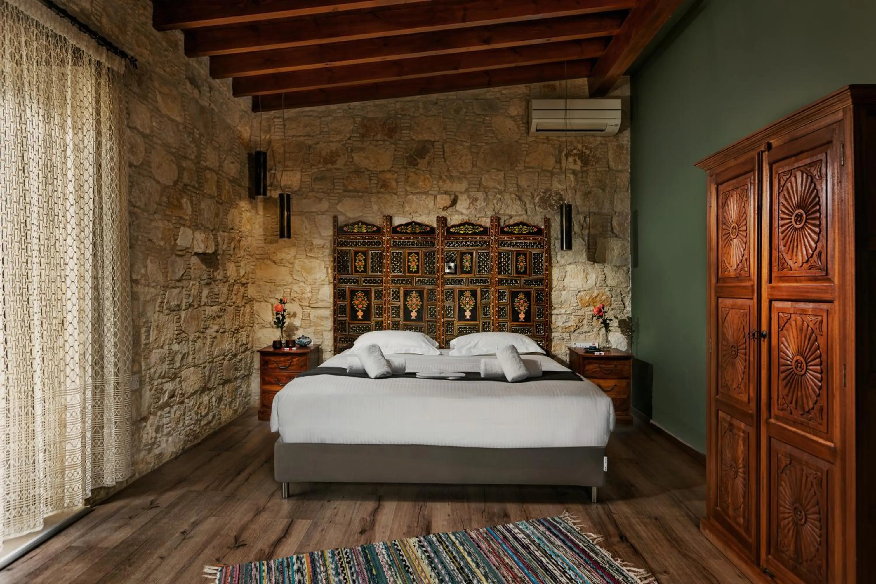 Bed in Oinoessa Traditional Boutique Guest Houses