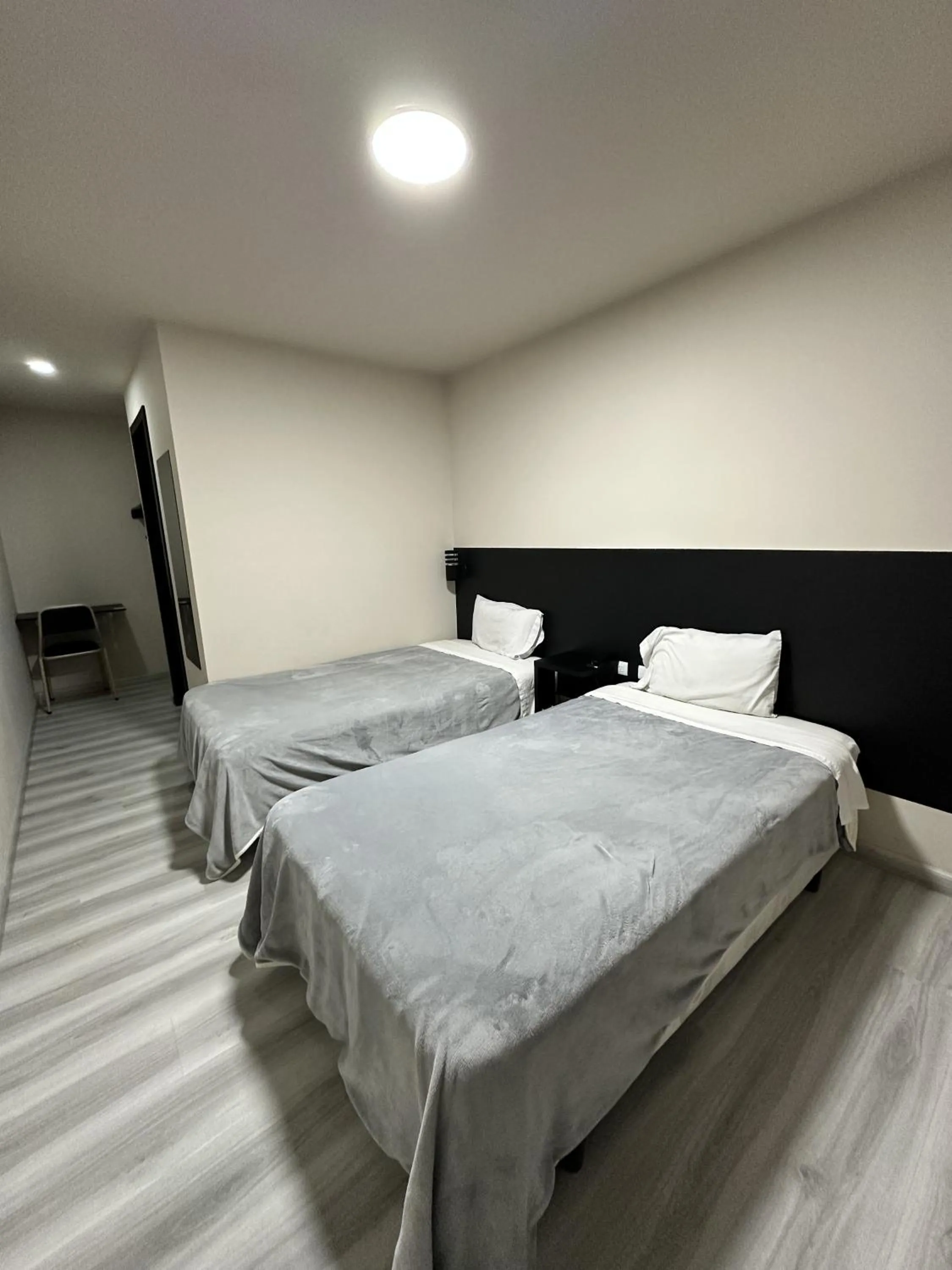 Bed in Hotel Versailles