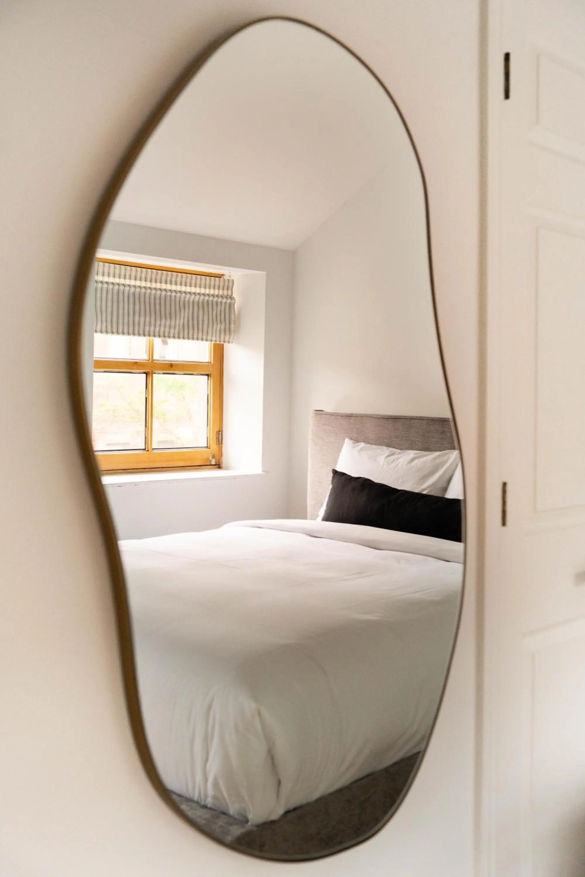 Bed in Maison Rasco by Luxury In Transit