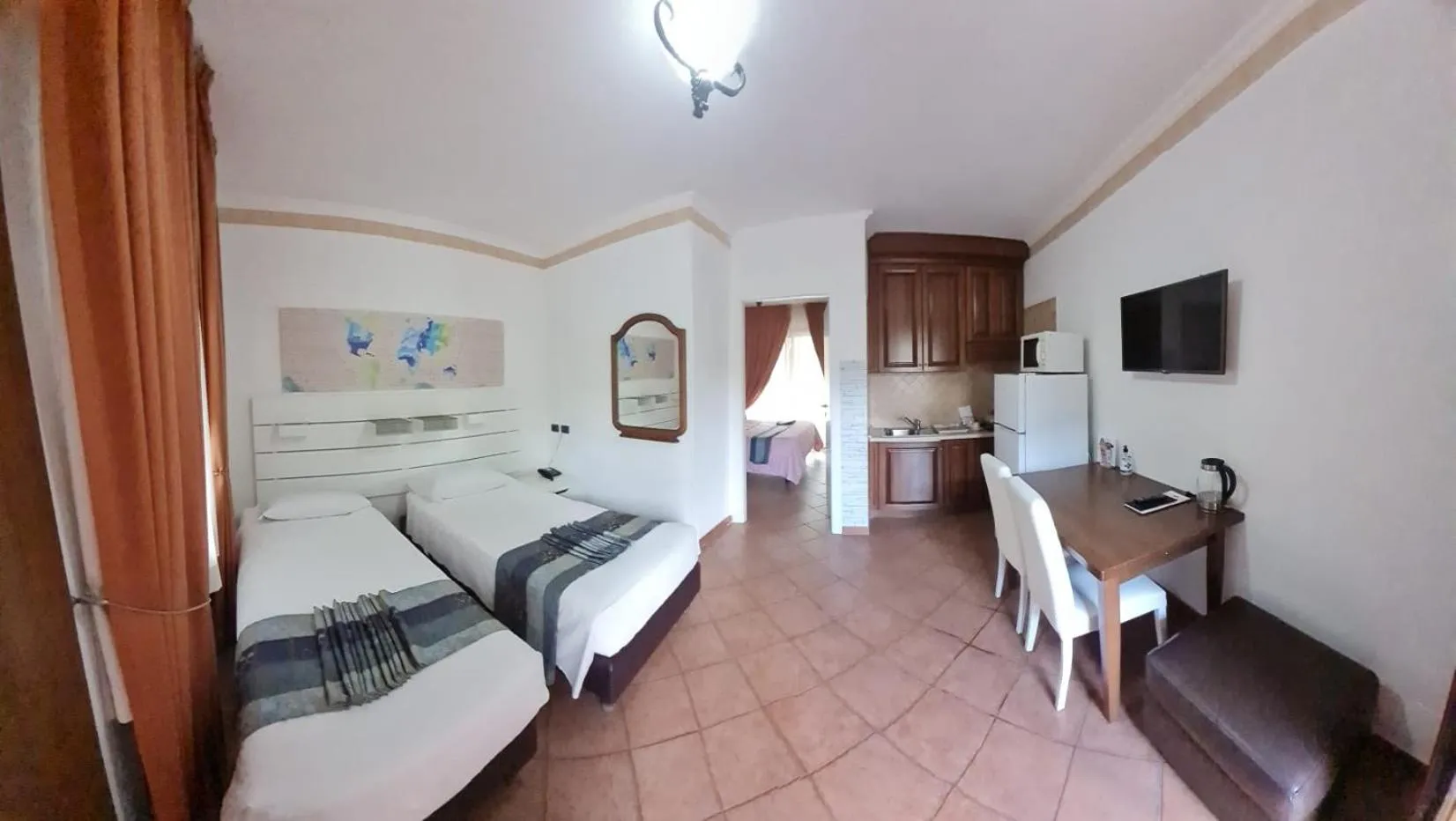 Communal lounge/ TV room in EURO HOUSE INN airport