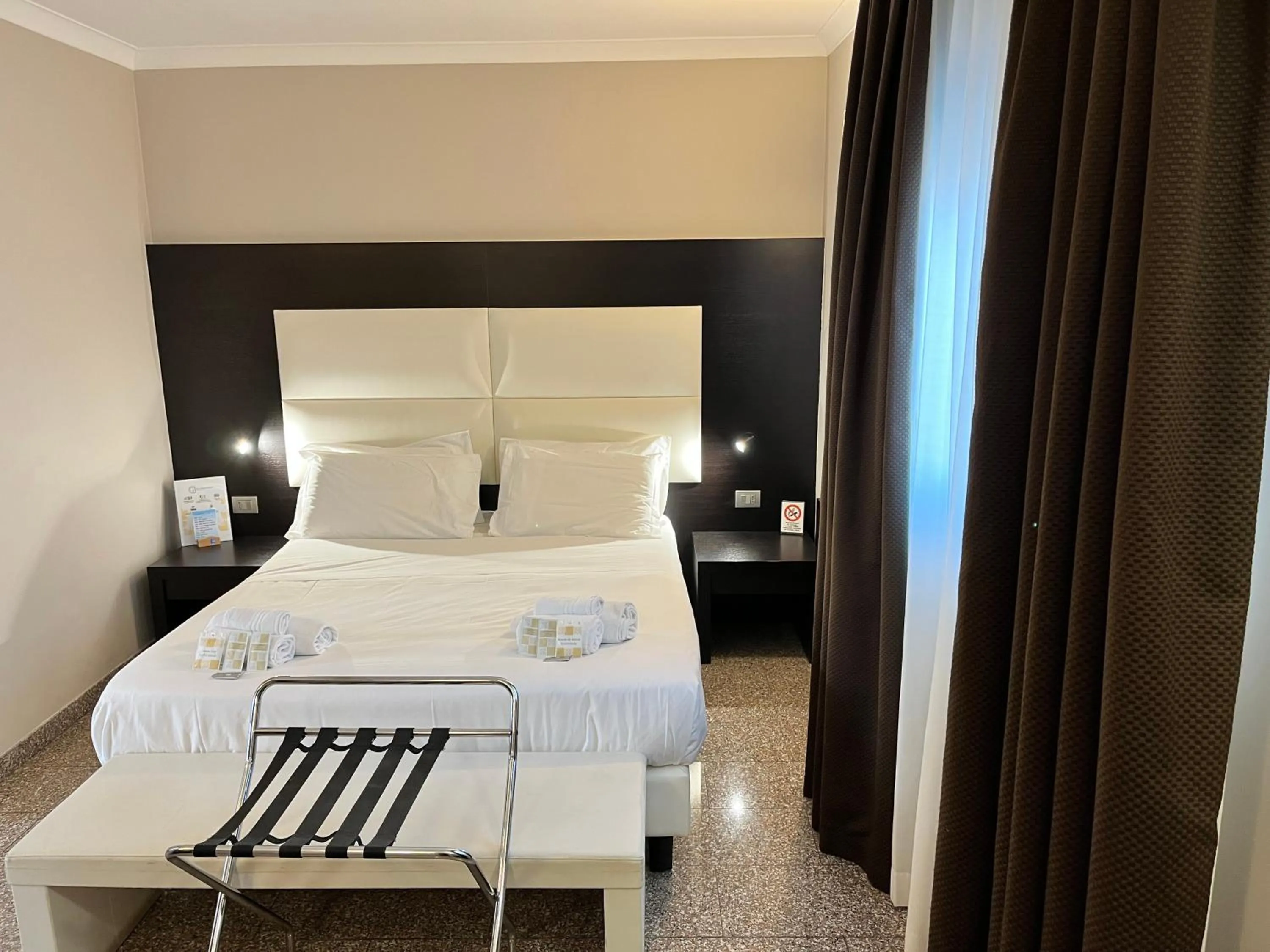 Bedroom, Bed in EH Suites Rome Airport Euro House Hotels