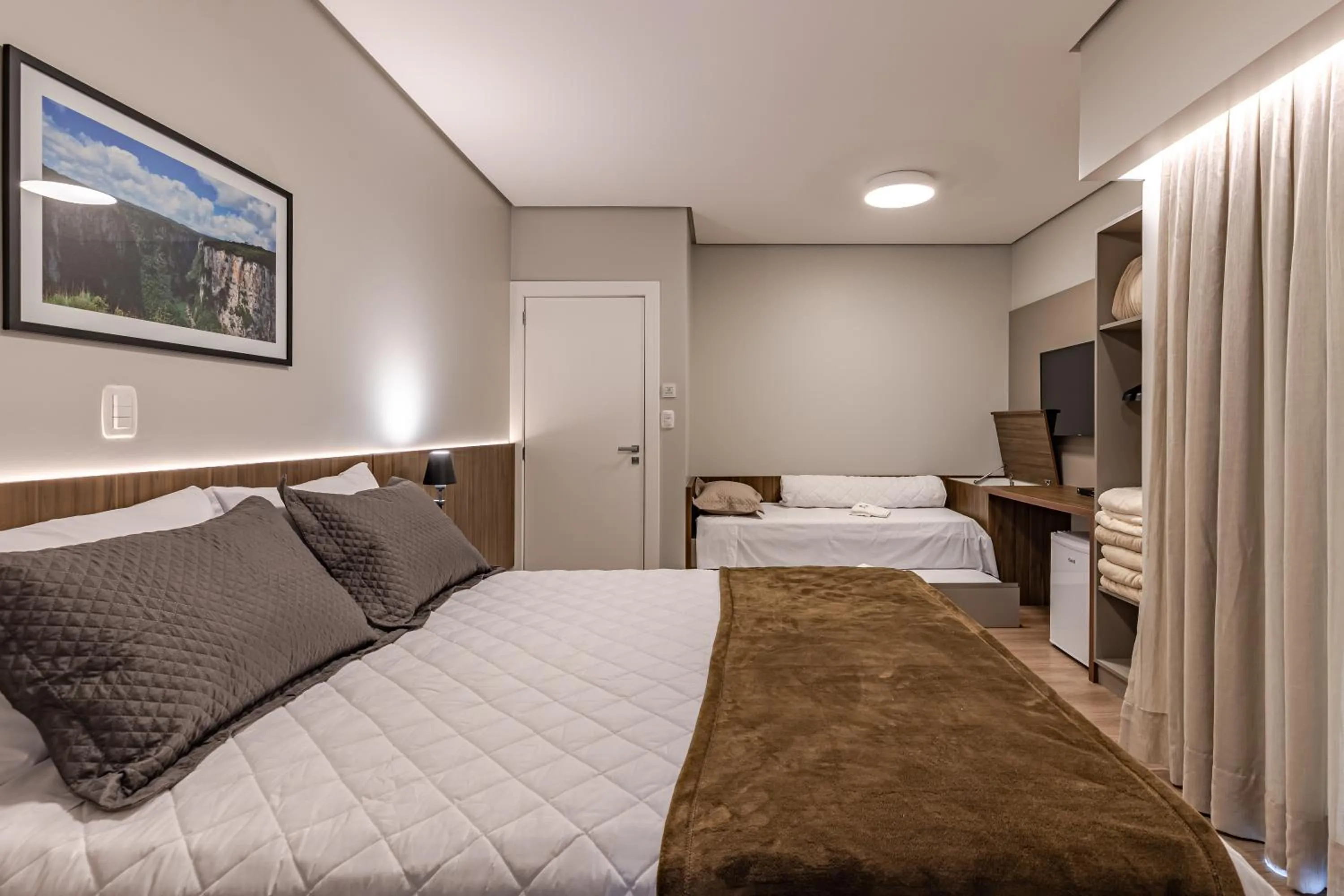 Bed in Pousada Serra Verde