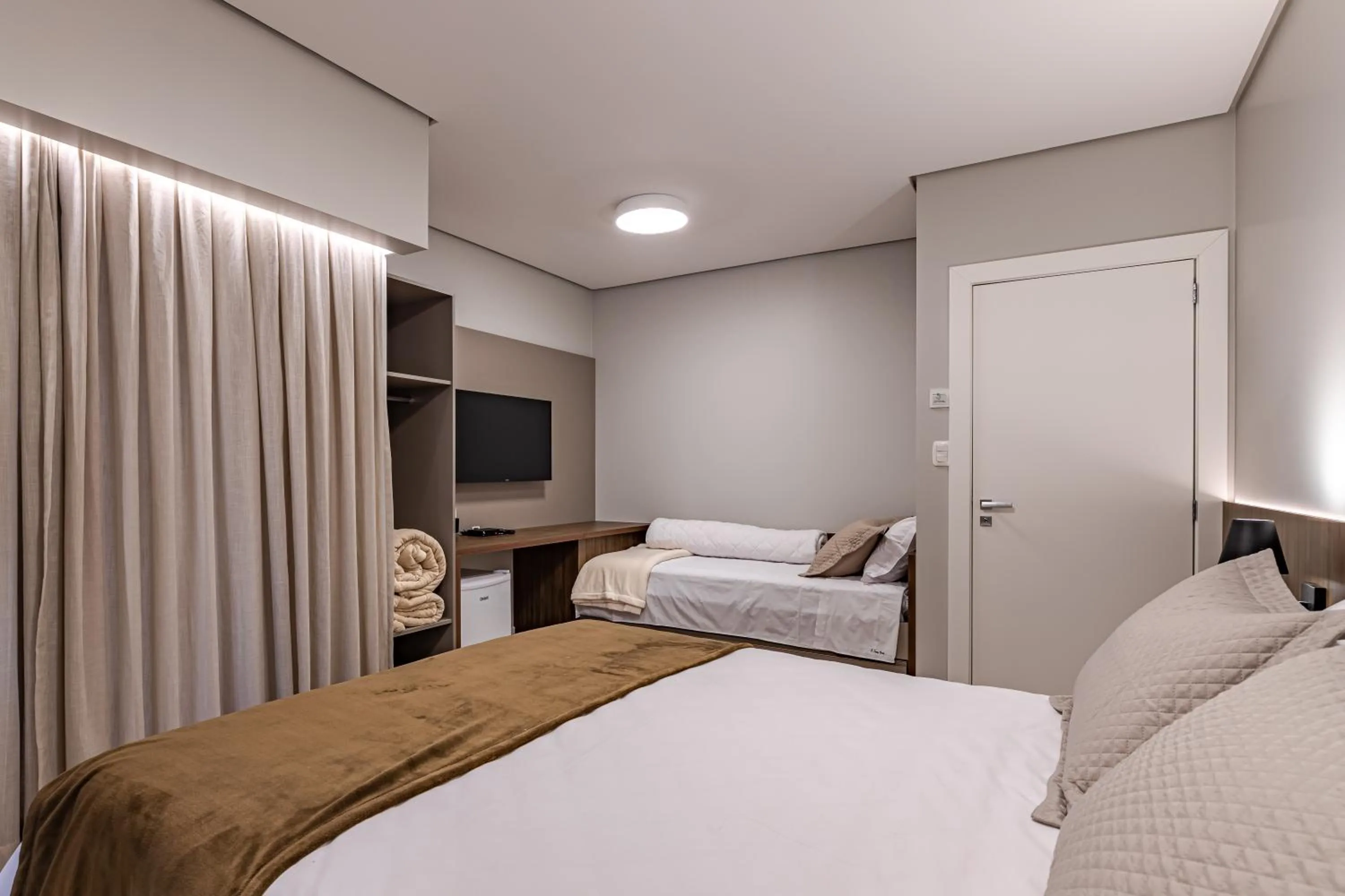 Bed in Pousada Serra Verde